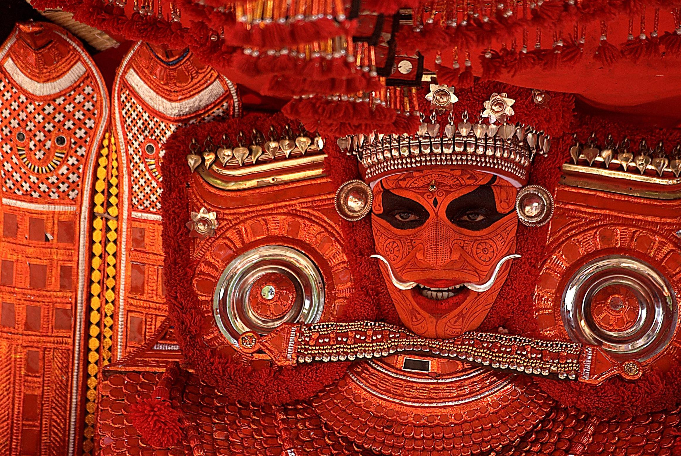 2323x1555 A Performer from the Theyyam religious ritual, Kerala, India