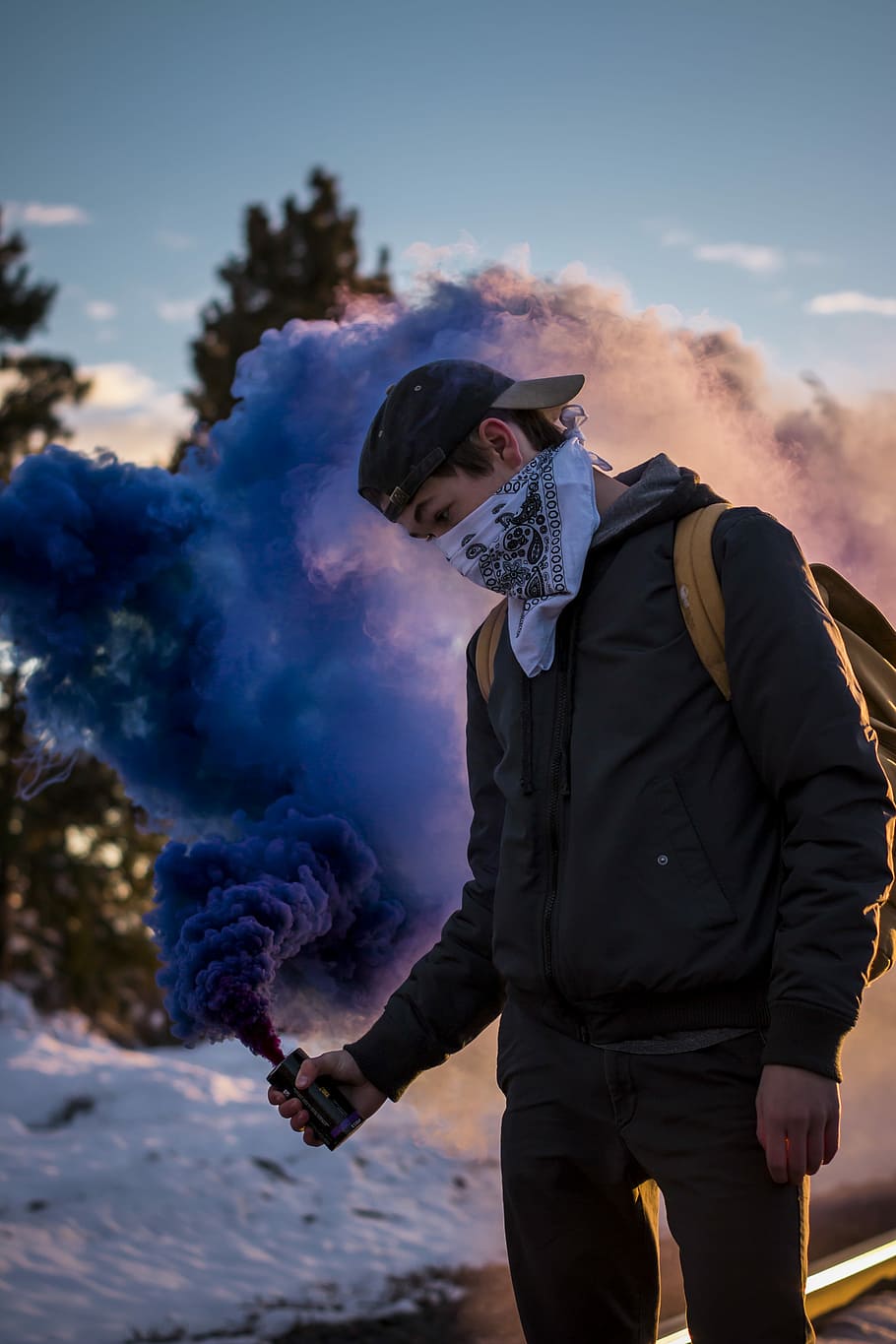 910x1365 HD wallpaper: man wearing bandana holding blue smoke can standing