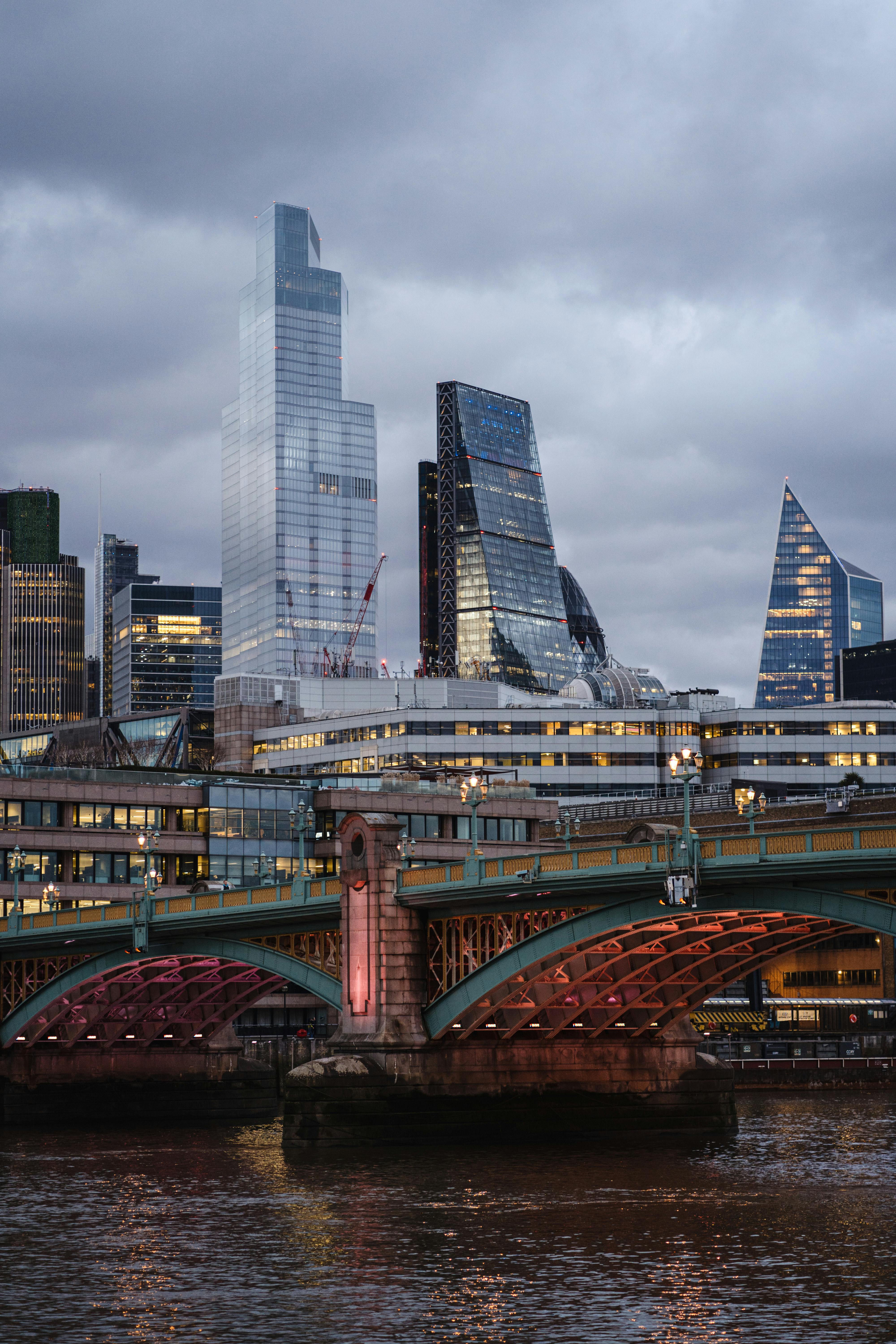 4000x6000 Contemporary financial buildings near suspension bridge · Free