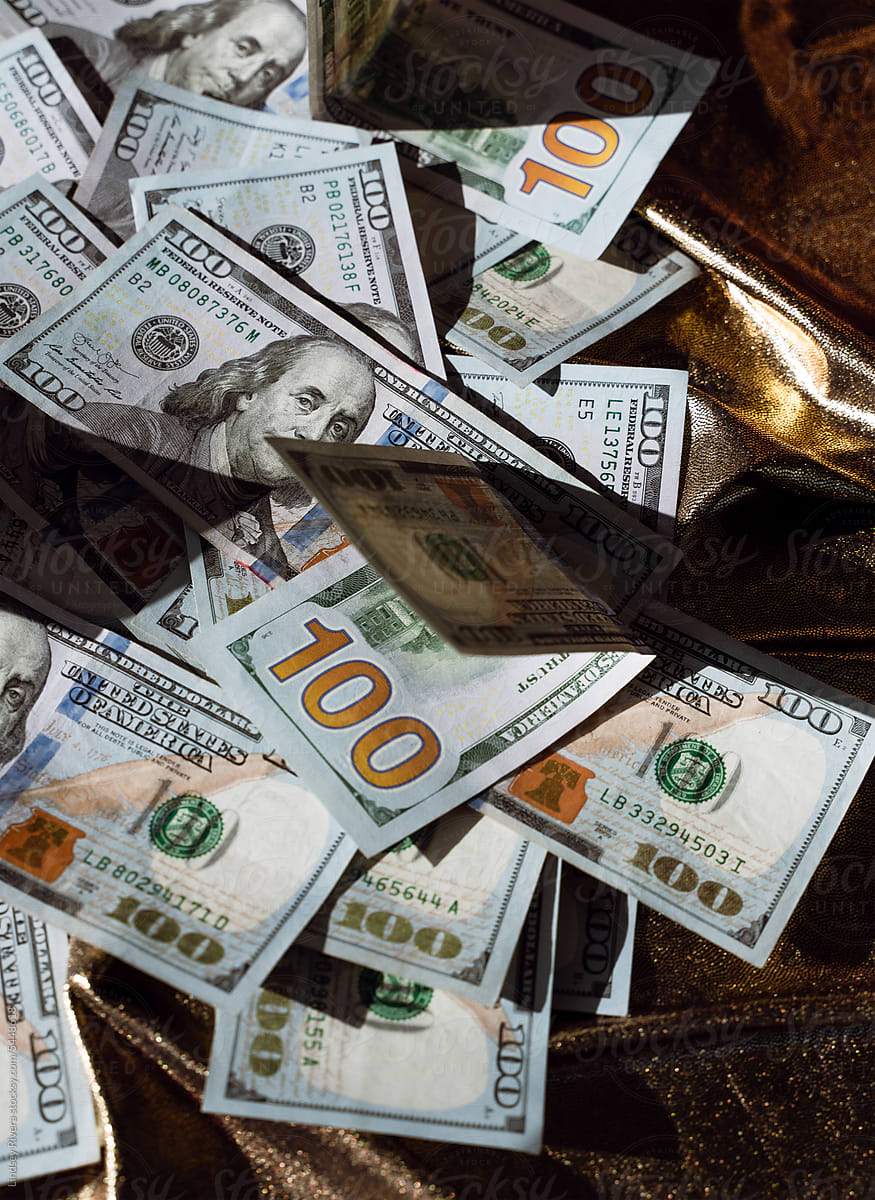 875x1200 $100 Bills On Gold Background