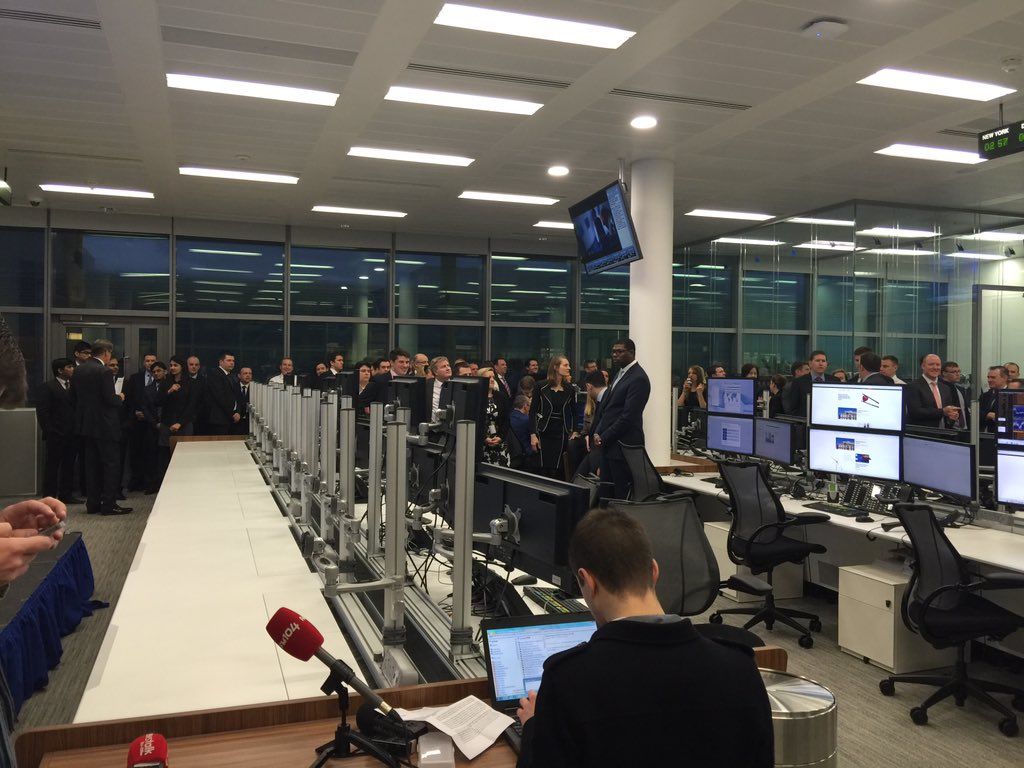 1024x768 Credit Suisse traders wait for the Taoiseach to officially open trading floor