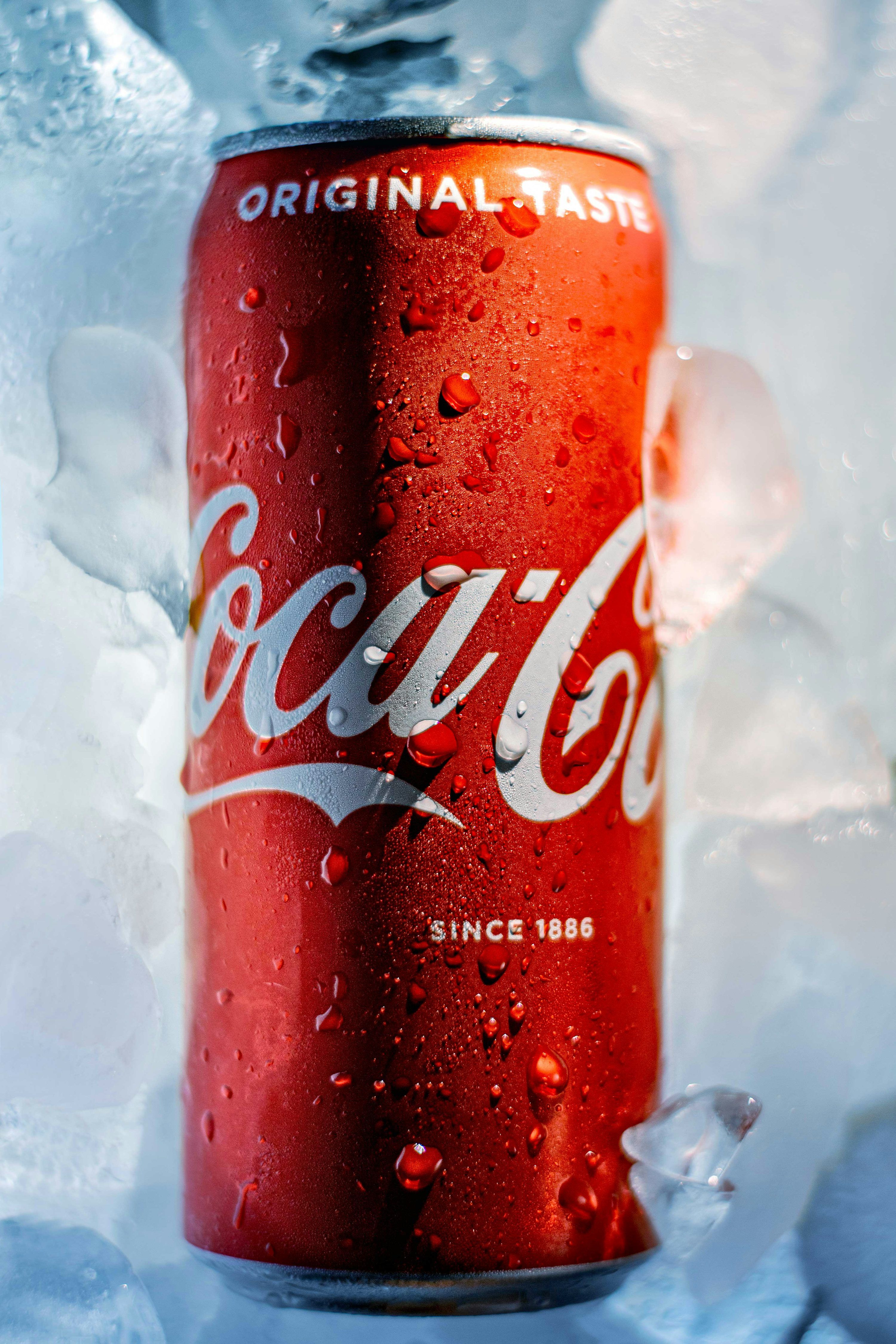 3000x4500 Coca cola can on black background photo