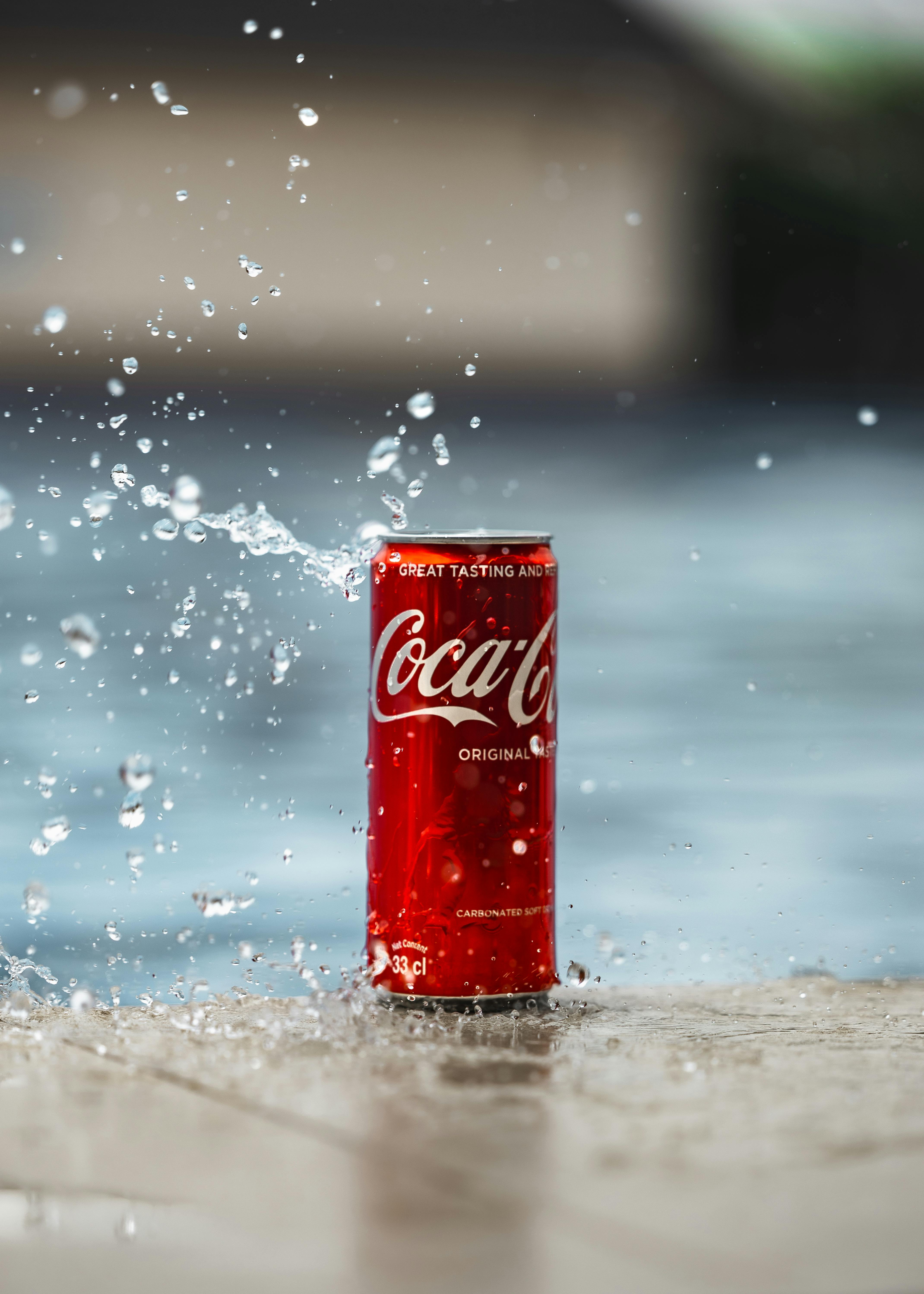 4280x5992 Refreshing Coca Cola Can Splashing In Water · Free