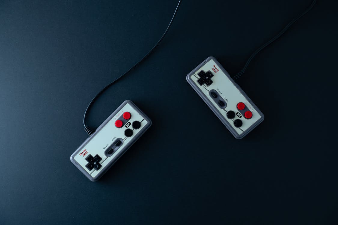 1125x750 Retro Dendy Console Controllers · Free
