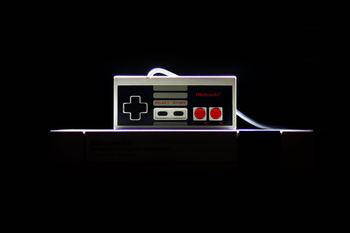 1125x750 Low Light Photo Of Nes Controller · Free