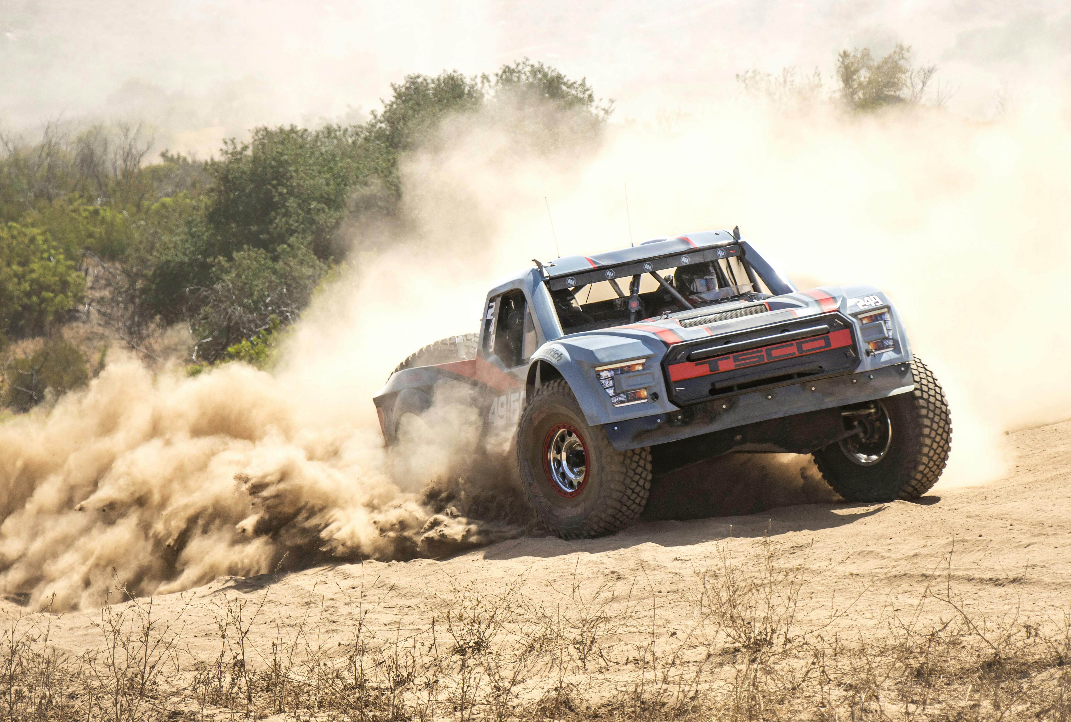 4095x2761 Pick Up Truck Driving on a Dusty Dirt Road · Free