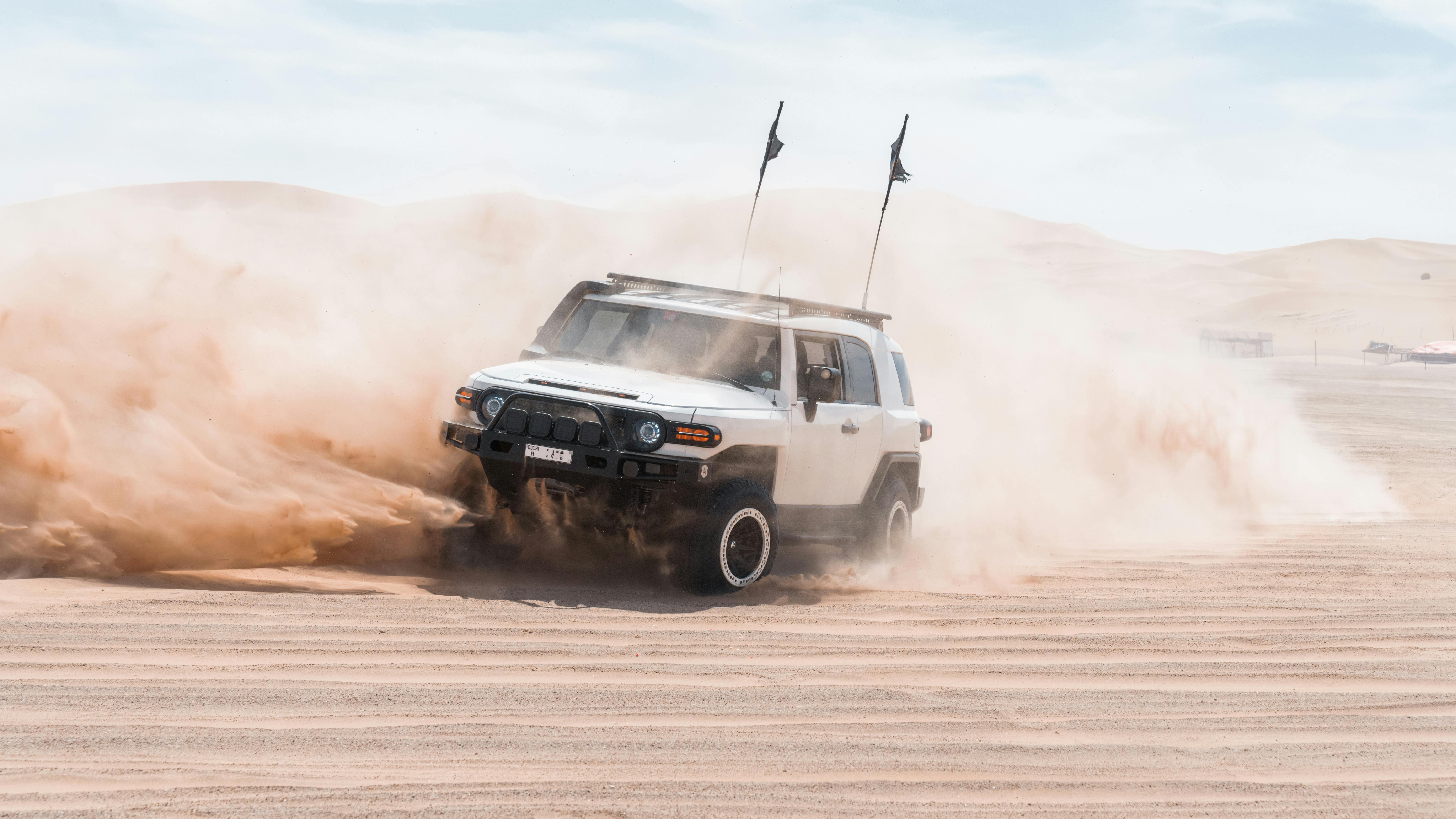 7008x3944 Car Racing in Desert · Free