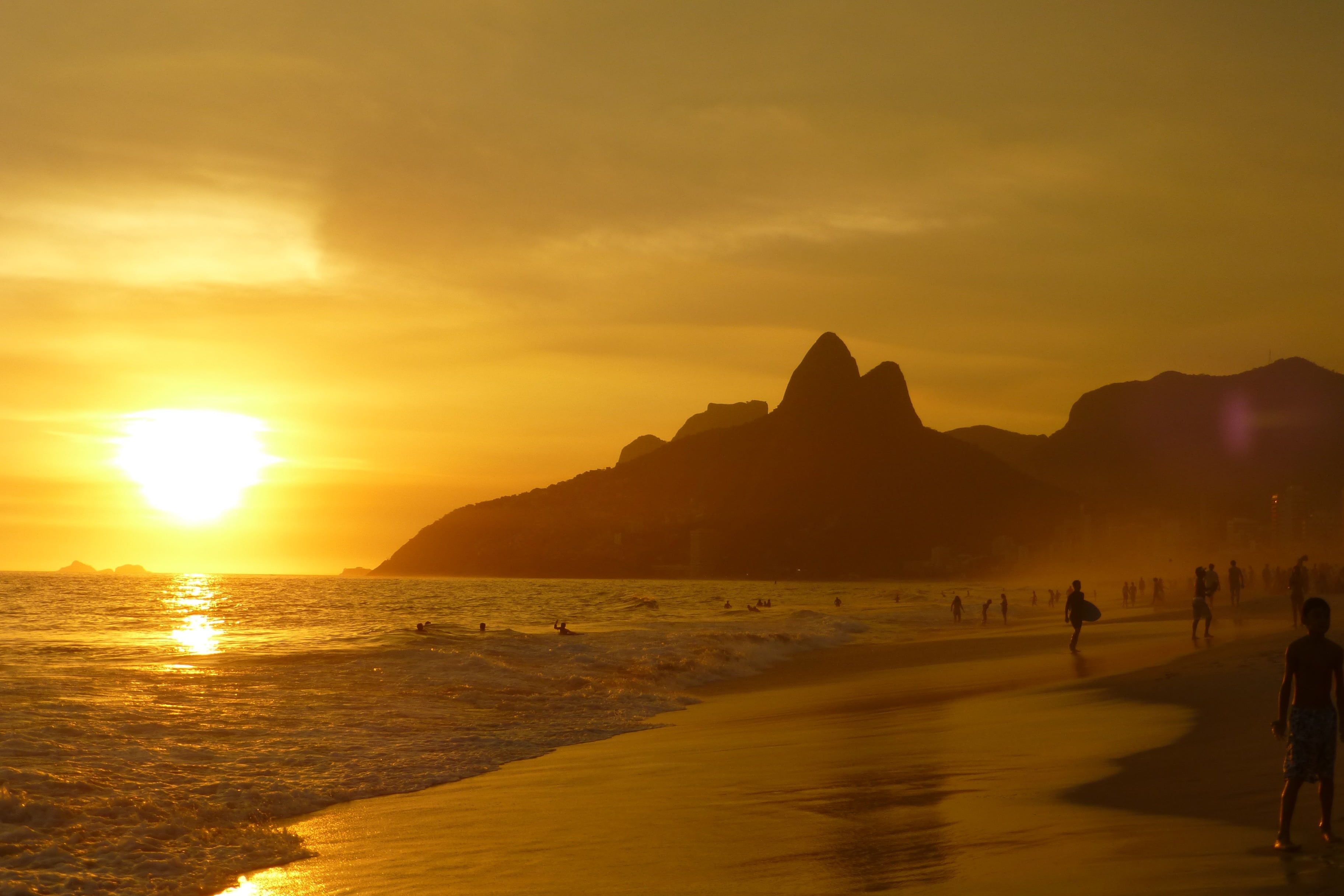 3648x2432 Royalty Free Photo: Lot Of People On Seashore During Sunset