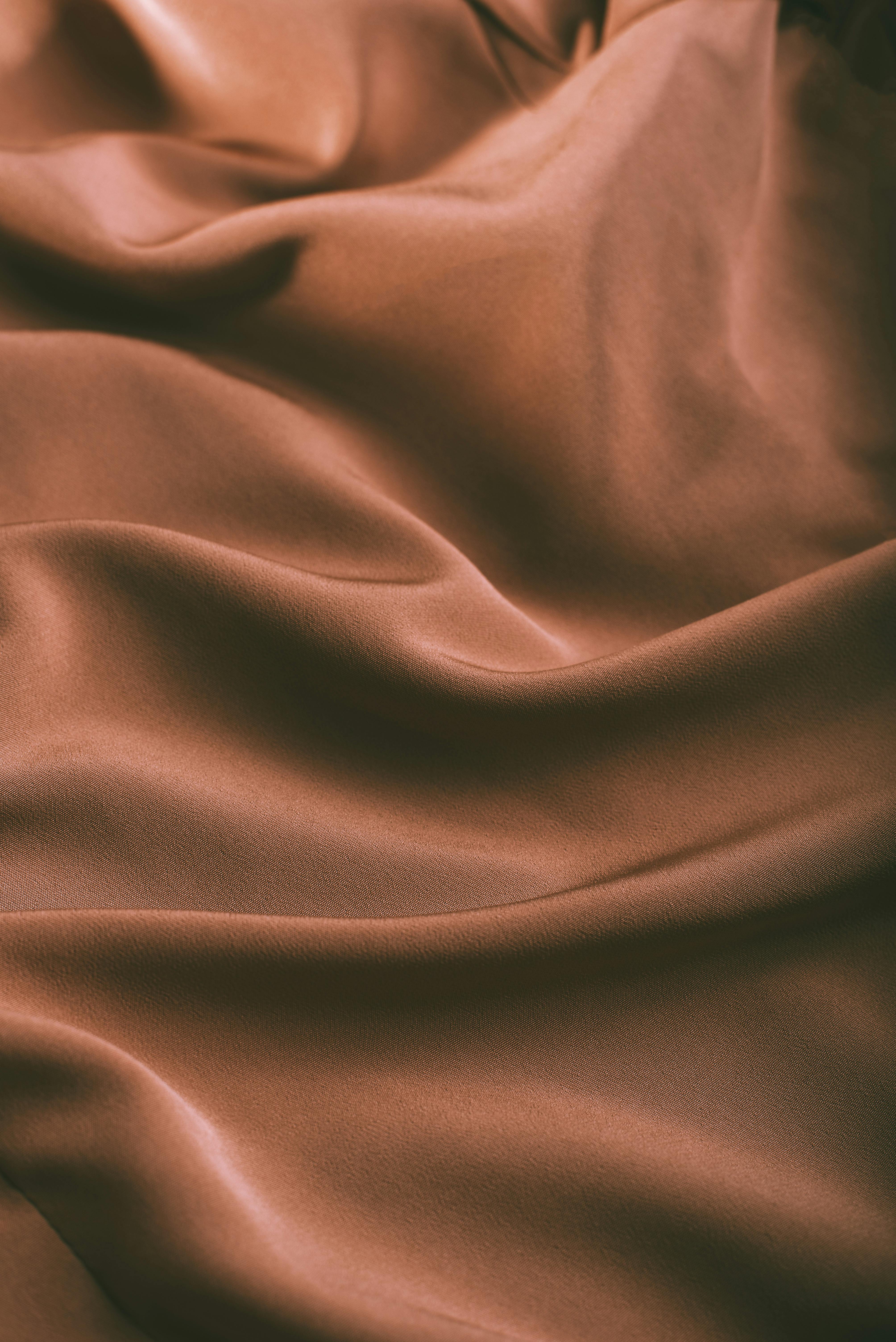 4016x6016 Background of smooth rippled brown silk fabric · Free