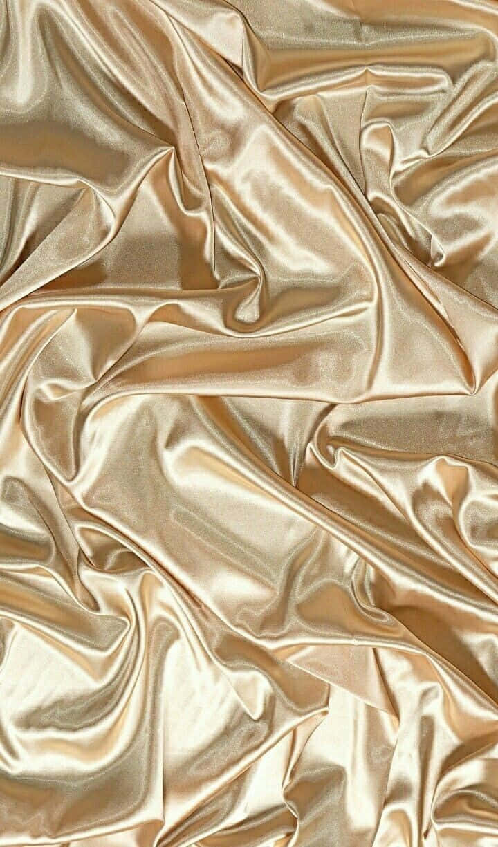 720x1225 Download Rich golden silk fabric shining in the light. Wallpaper