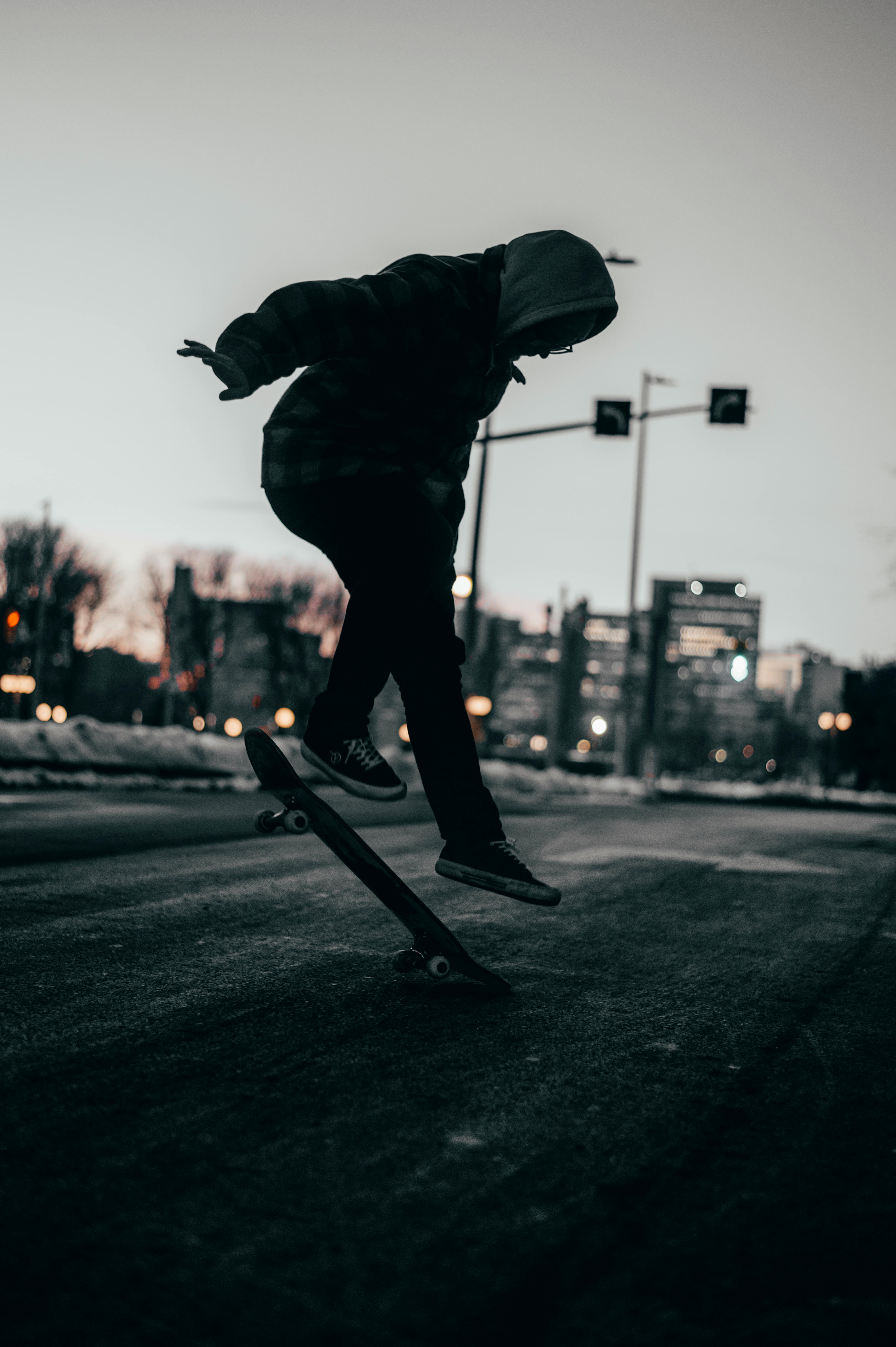 4657x7000 Person Kickflipping · Free