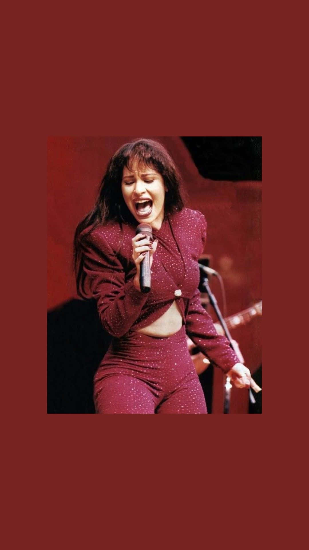 1080x1920 Download Celebrate the Music of Selena Quintanilla with this Fiery iPhone Wallpaper