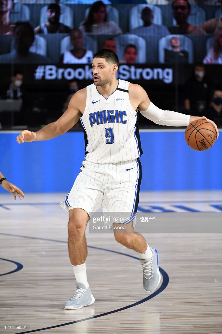 736x1104 Nikola Vucevic of the Orlando Magic handles the ball during the game