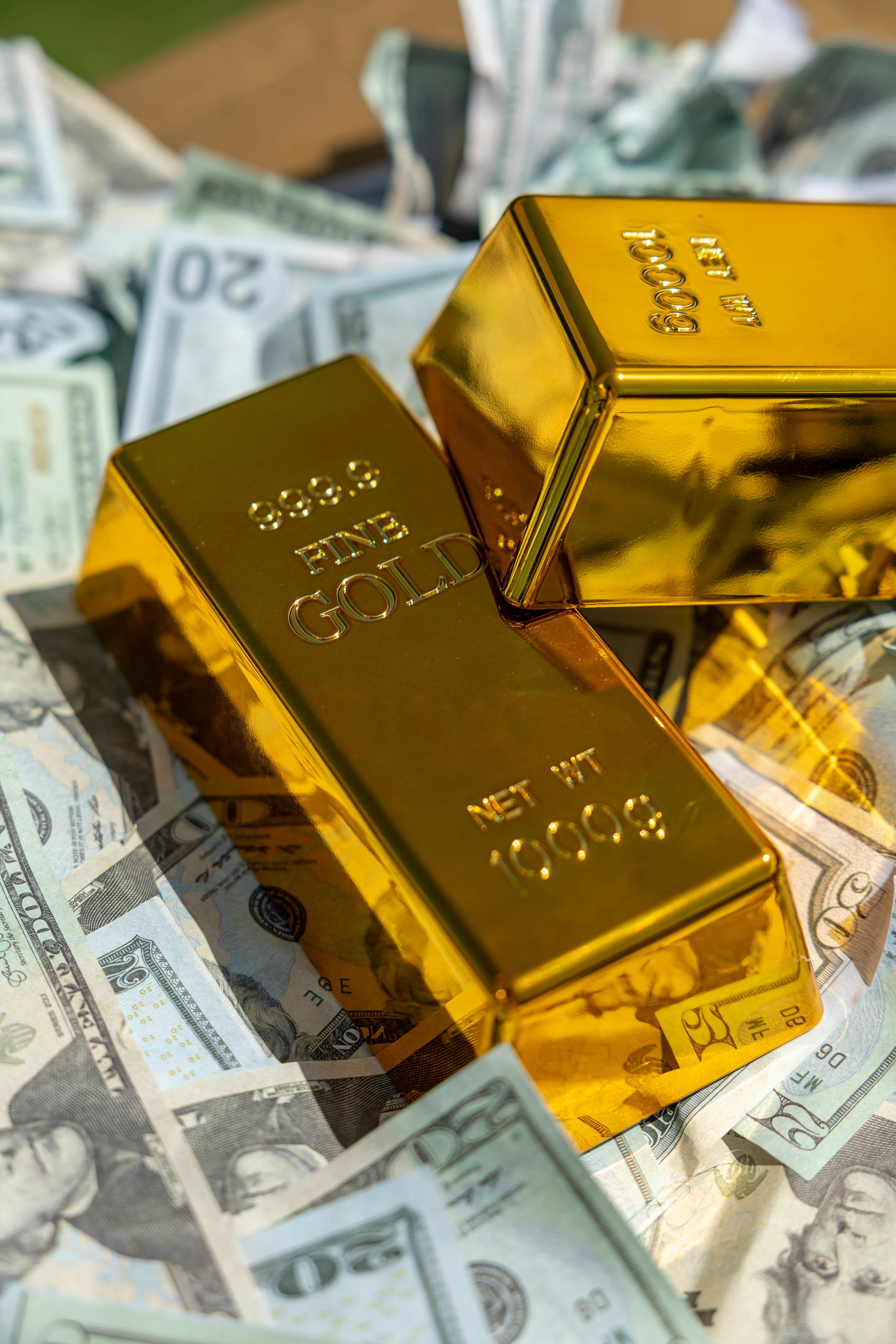 4000x6000 Stack of Gold Bars with Money Background · Free