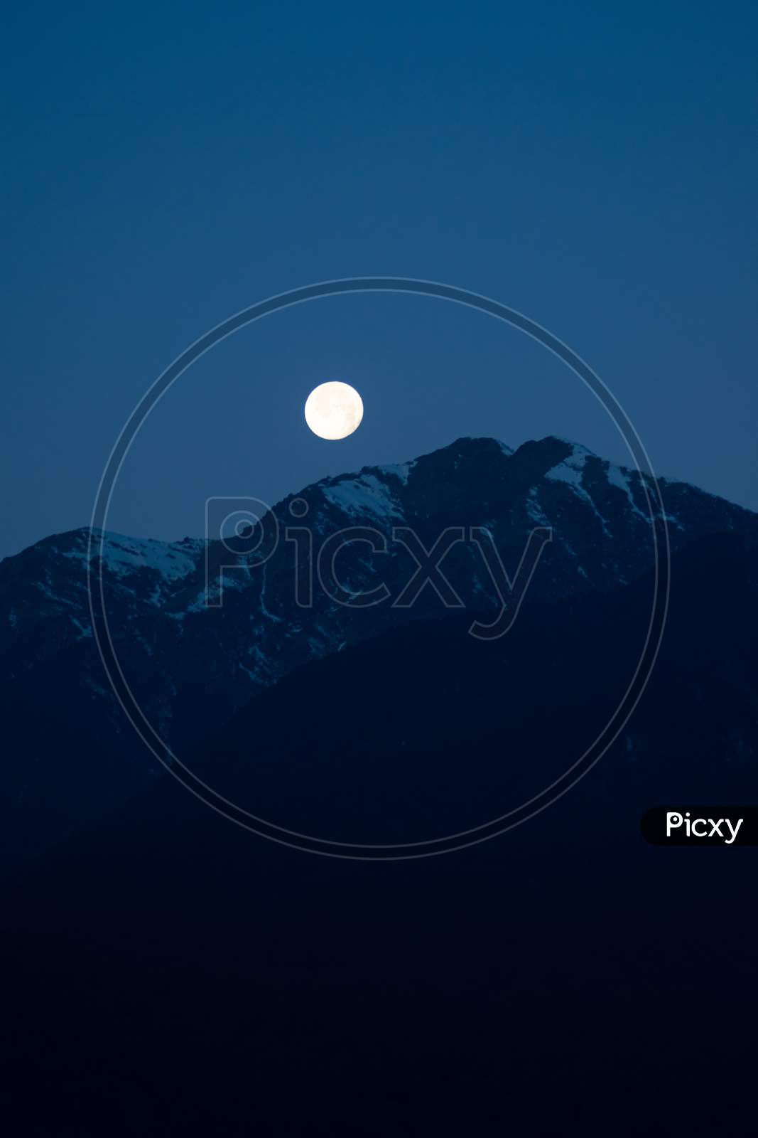 1067x1600 Image Of Bright Shining Moon Just Before The Sunrise Behind The Mountain NQ005740 Picxy