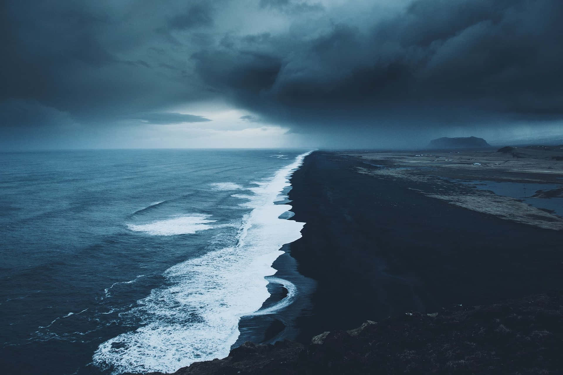 1920x1279 Download Enjoy a peaceful day of relaxation at this tranquil Black Sand Beach Wallpaper