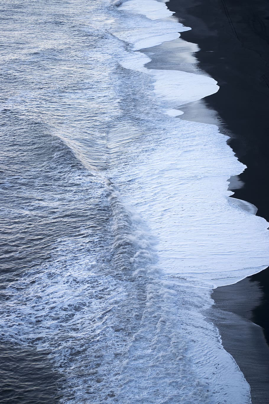 910x1365 iceland, reynisfjara black sand beach, ocean, black and white, black sand, wave, water, sea