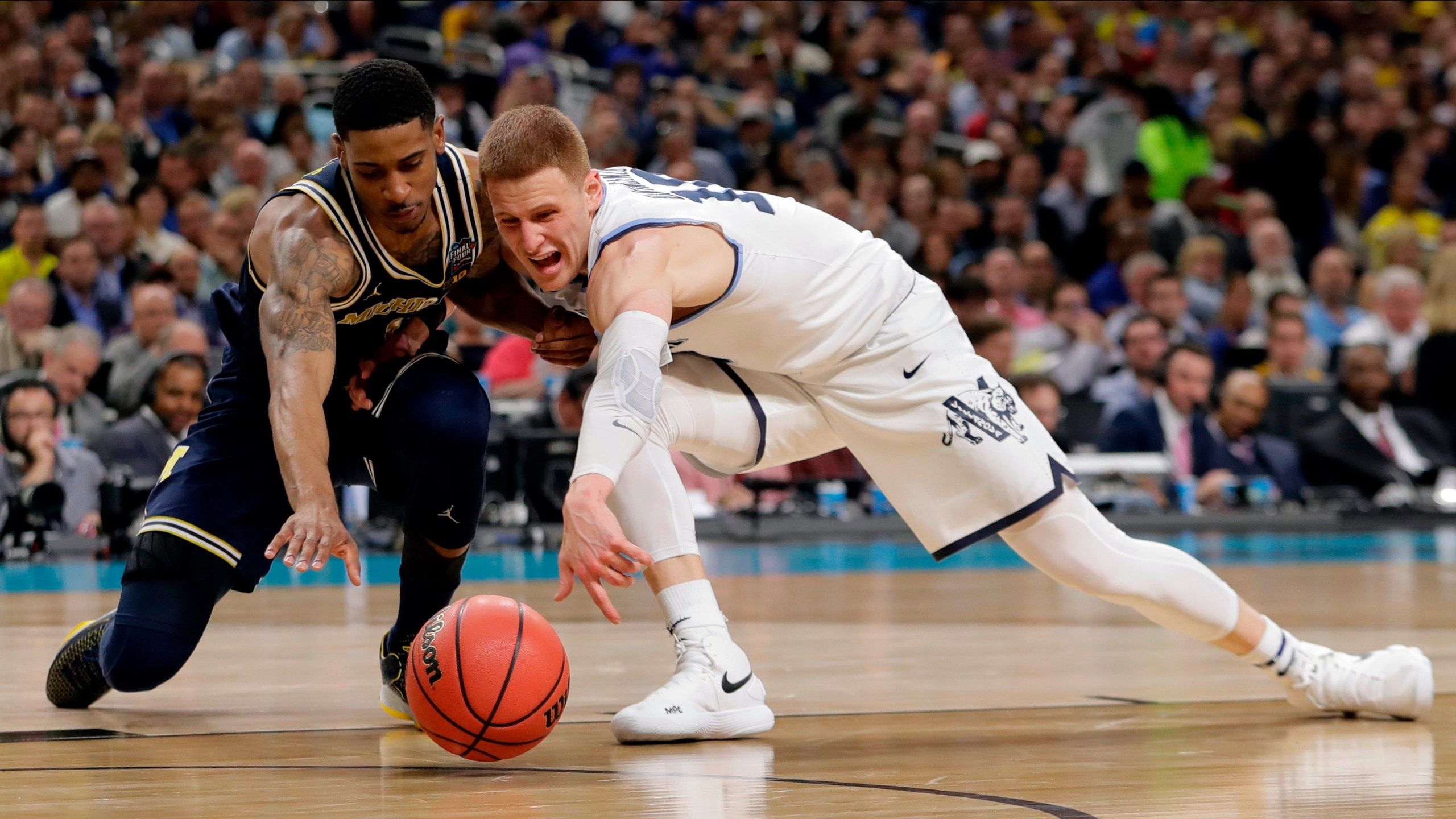 2560x1440 DiVincenzo Makes It Rain; Nova Tops Michigan 79 62 For Title