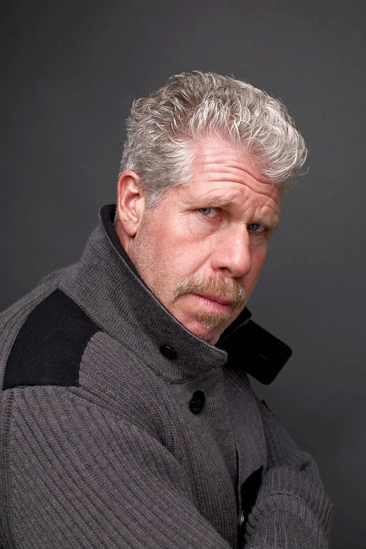1280x1920 Download Ron Perlman In High Collared Jacket Wallpaper