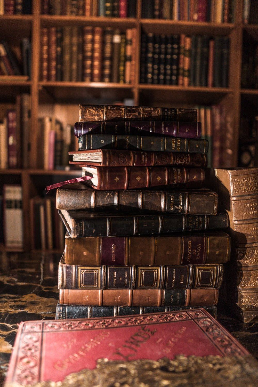 1000x1500 Download Cool Vintage Books On Table Portrait Wallpaper