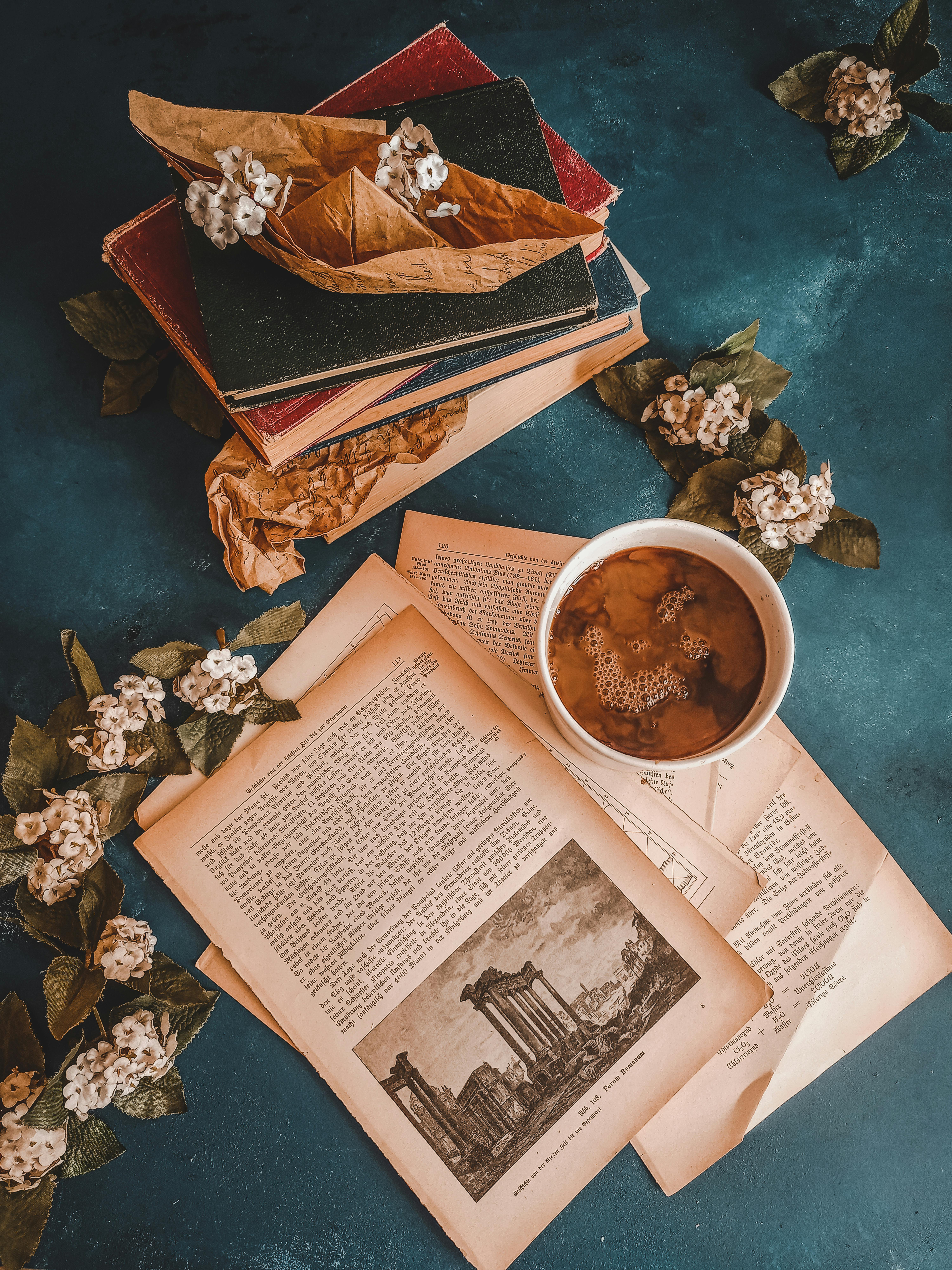 6000x8000 Overhead Shot of a Stack of Books and Coffee · Free
