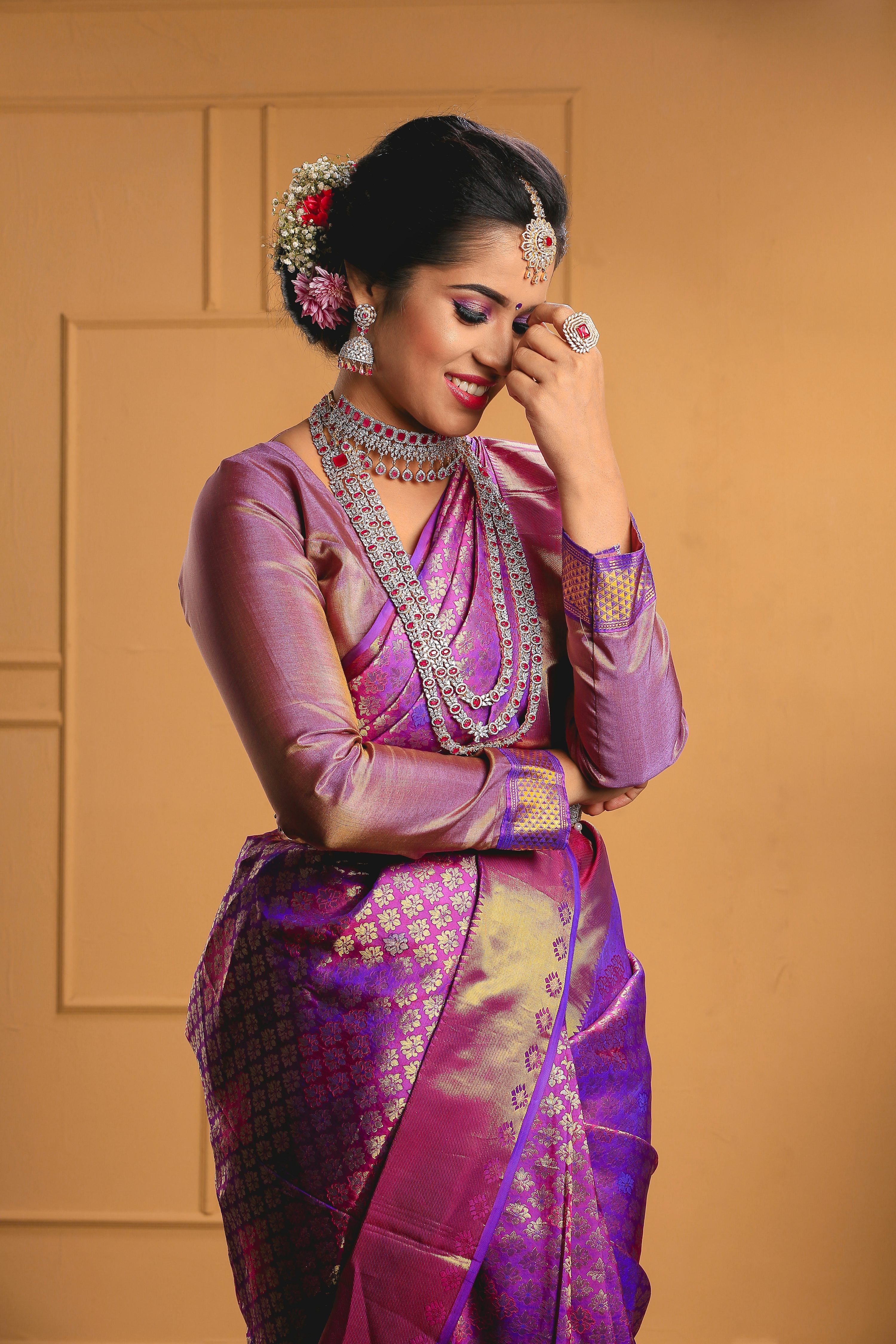 3000x4500 A woman in a purple and gold sari photo
