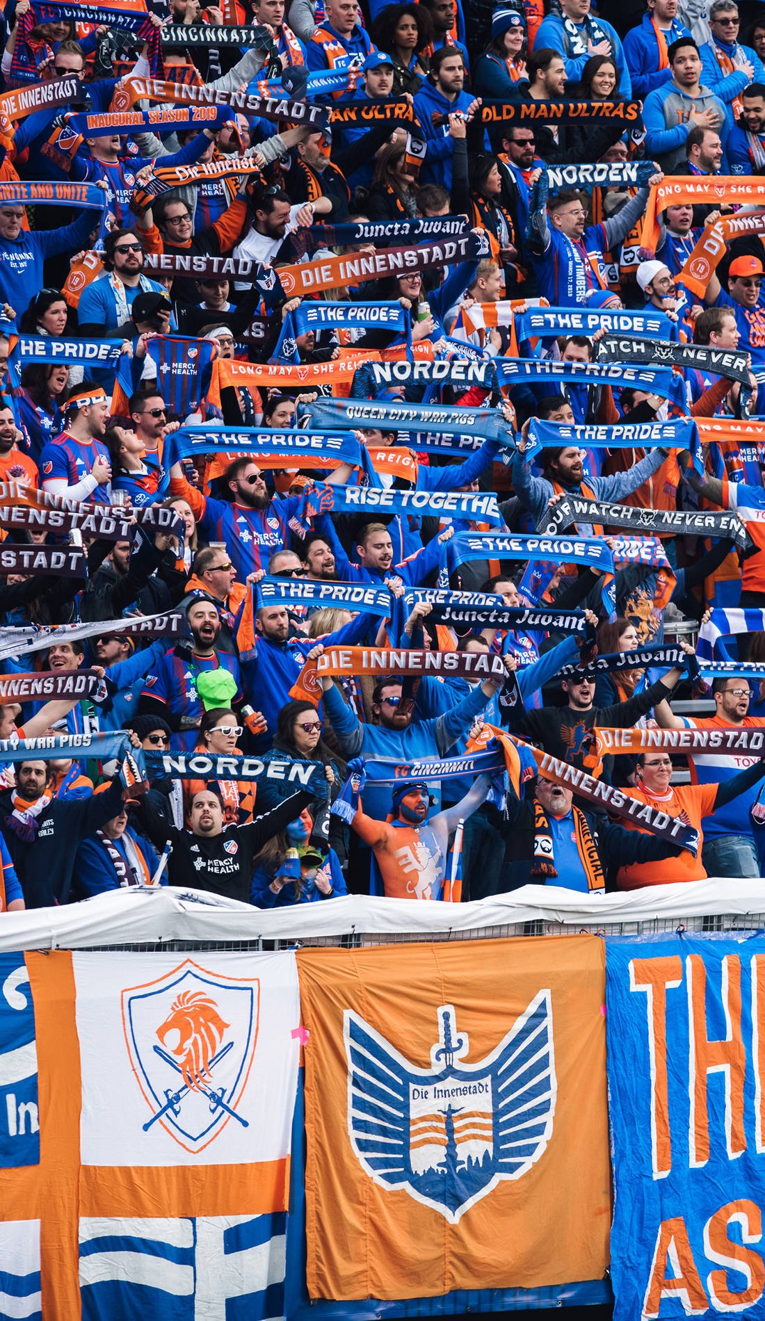 1100x1900 Download The Fc Cincinnati Fans Are Joyfully Cheering Wallpaper