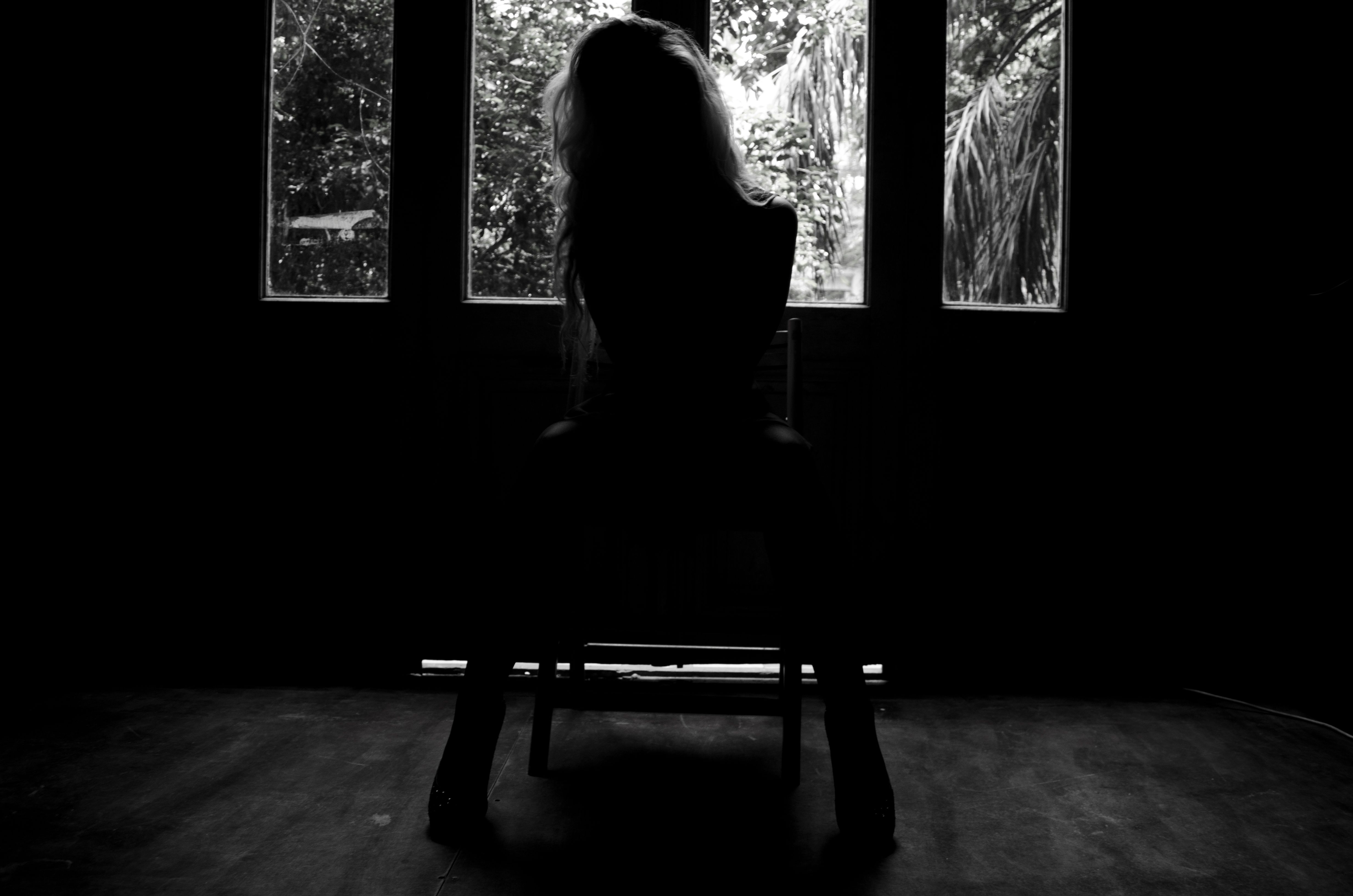 4928x3264 Woman Silhouette in Dark Room Wallpaper and Free Stock