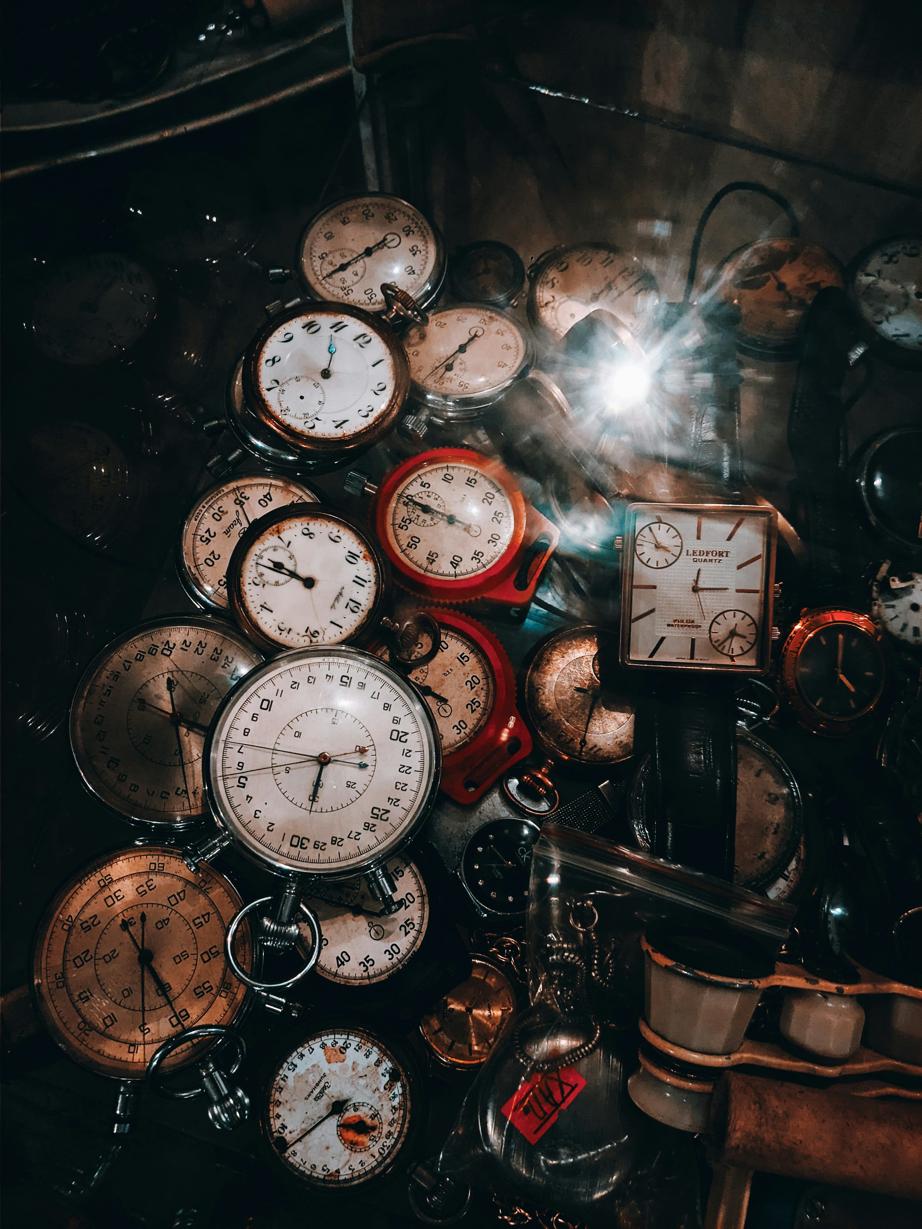3000x4000 A bunch of clocks sitting on top of a table photo