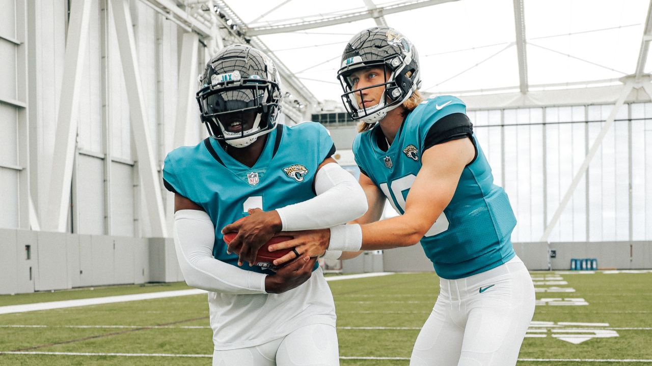 1280x720 Photos. Jaguars QB Trevor Lawrence and RB Travis Etienne Jr. in Uniform