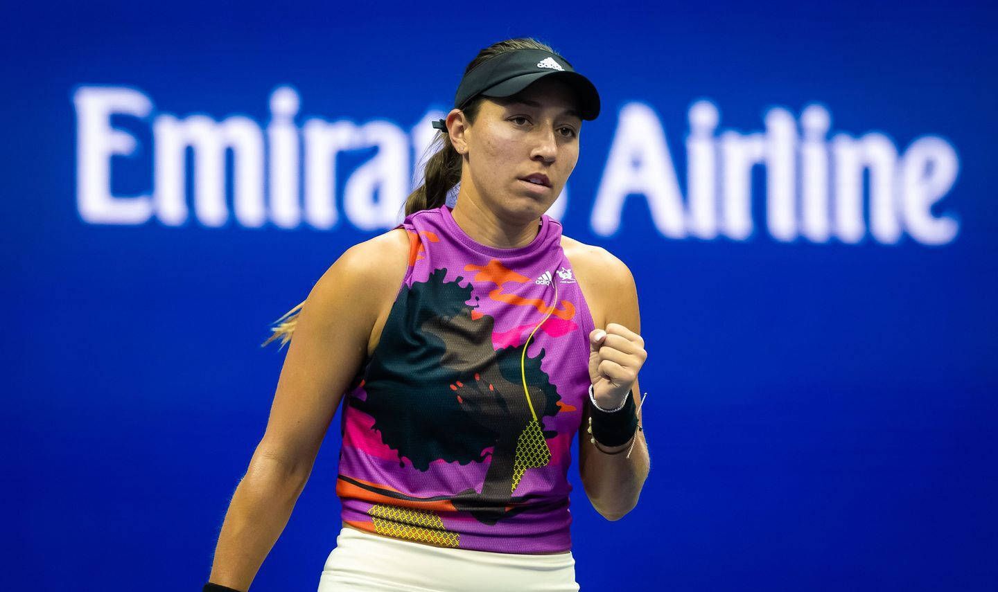 1440x855 Download Determined Tennis Star Pegula In Action Wallpaper