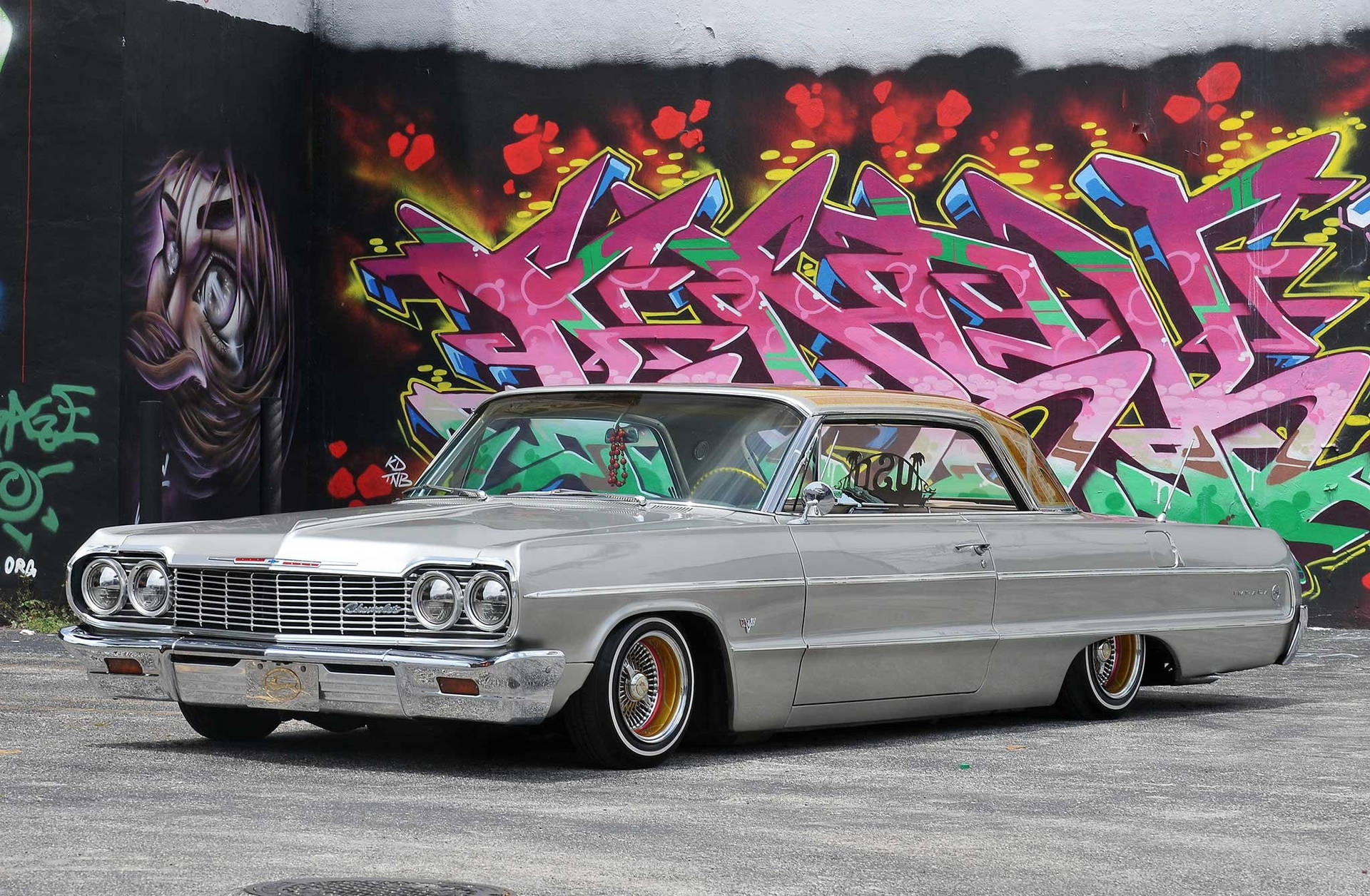 1920x1256 Download Lowrider Impala Against Colorful Mural Wallpaper