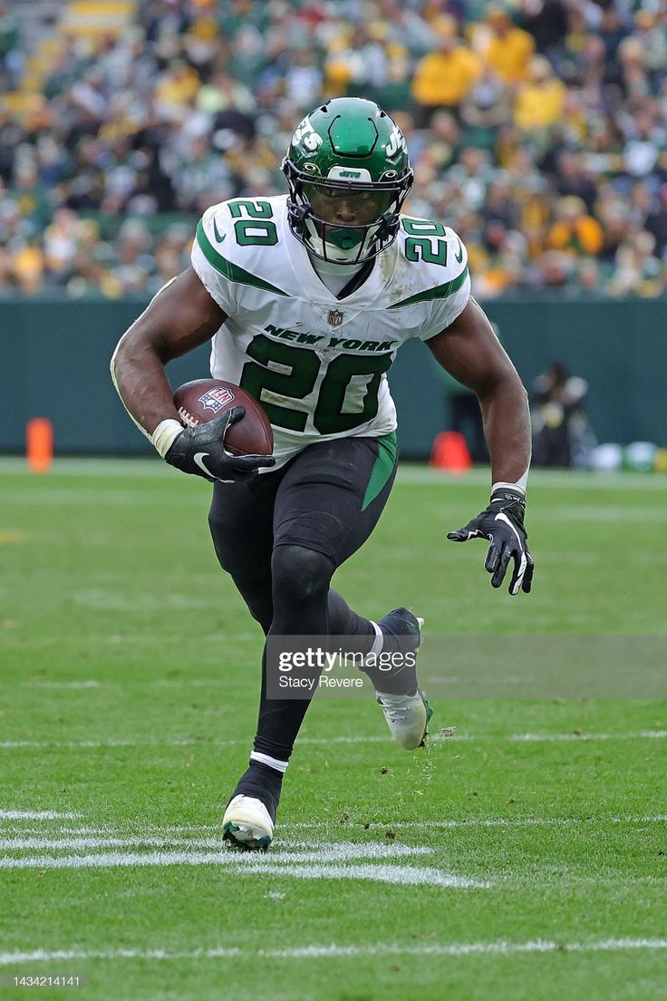 736x1104 Breece Hall of the New York Jets runs for yards during a game against