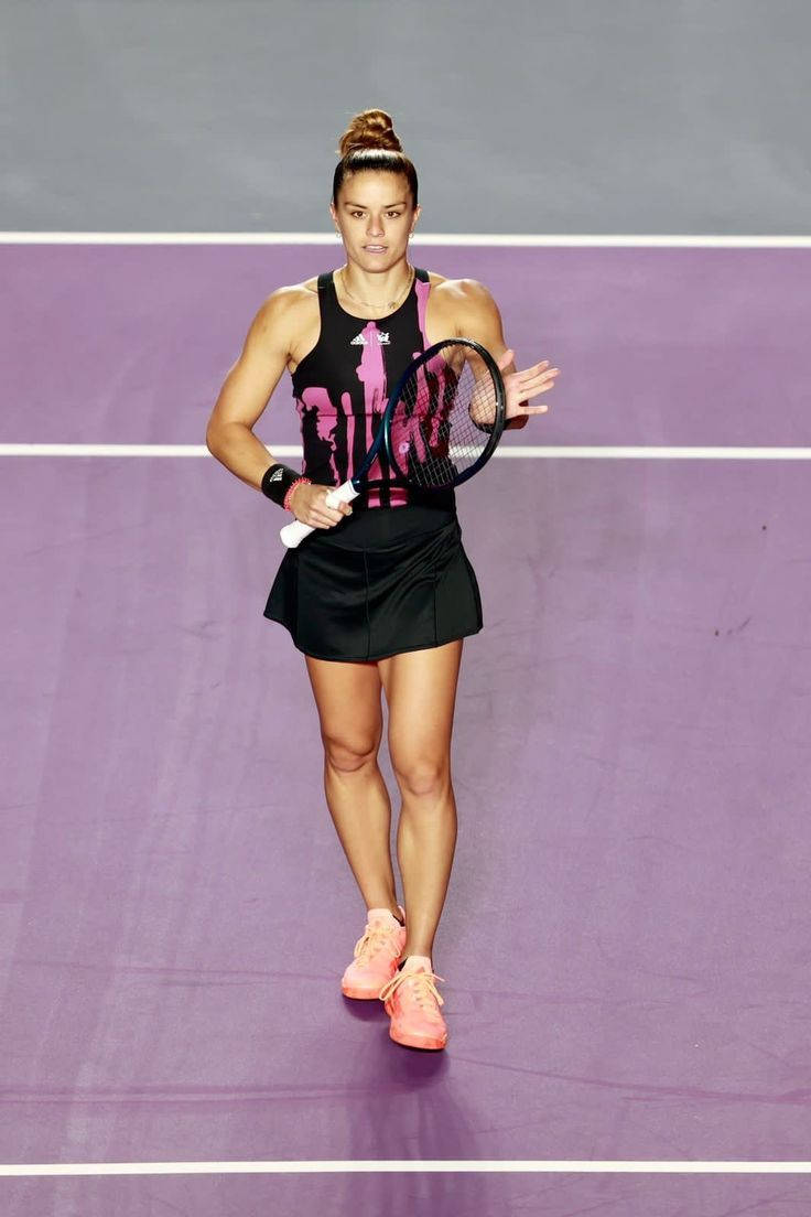 736x1104 Download Maria Sakkari Walking On Court Wallpaper