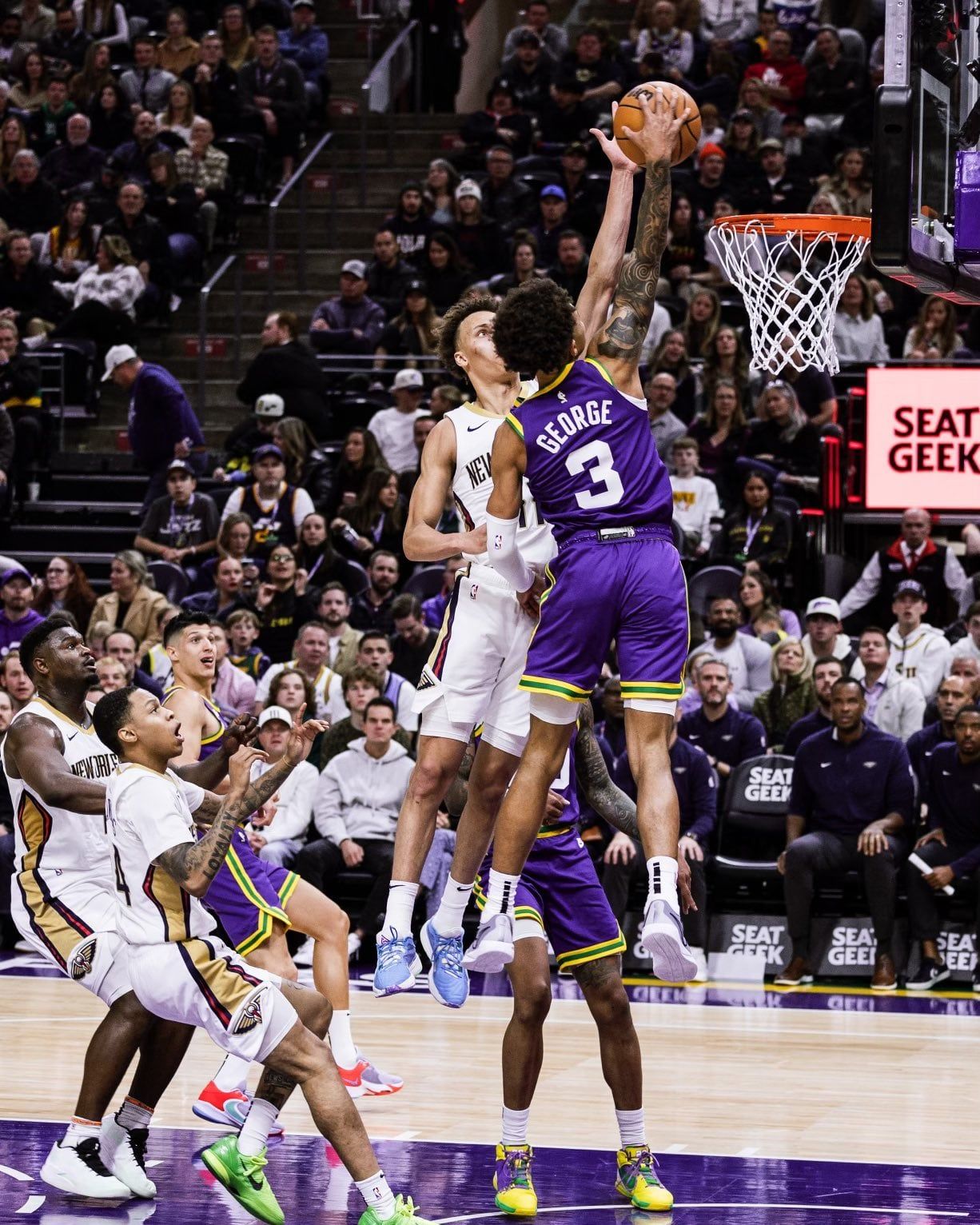 1226x1532 Jazz rookie Keyonte George with a poster