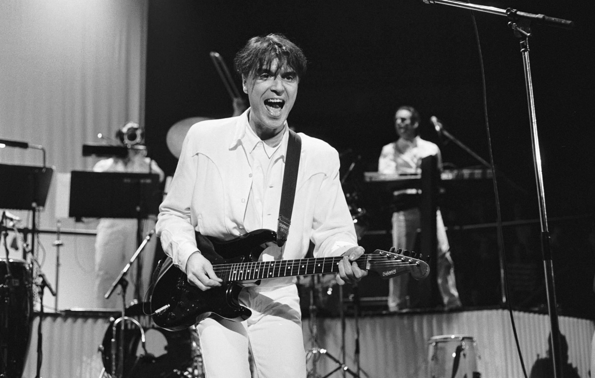 1920x1219 Download David Byrne Guitar Performance Photography Wallpaper
