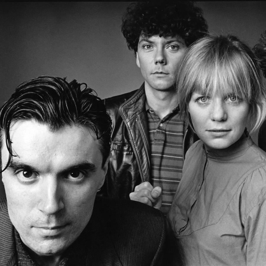 900x900 David Byrne, Jerry Harrison, And Tina Weymouth Of Talking Heads Wallpaper