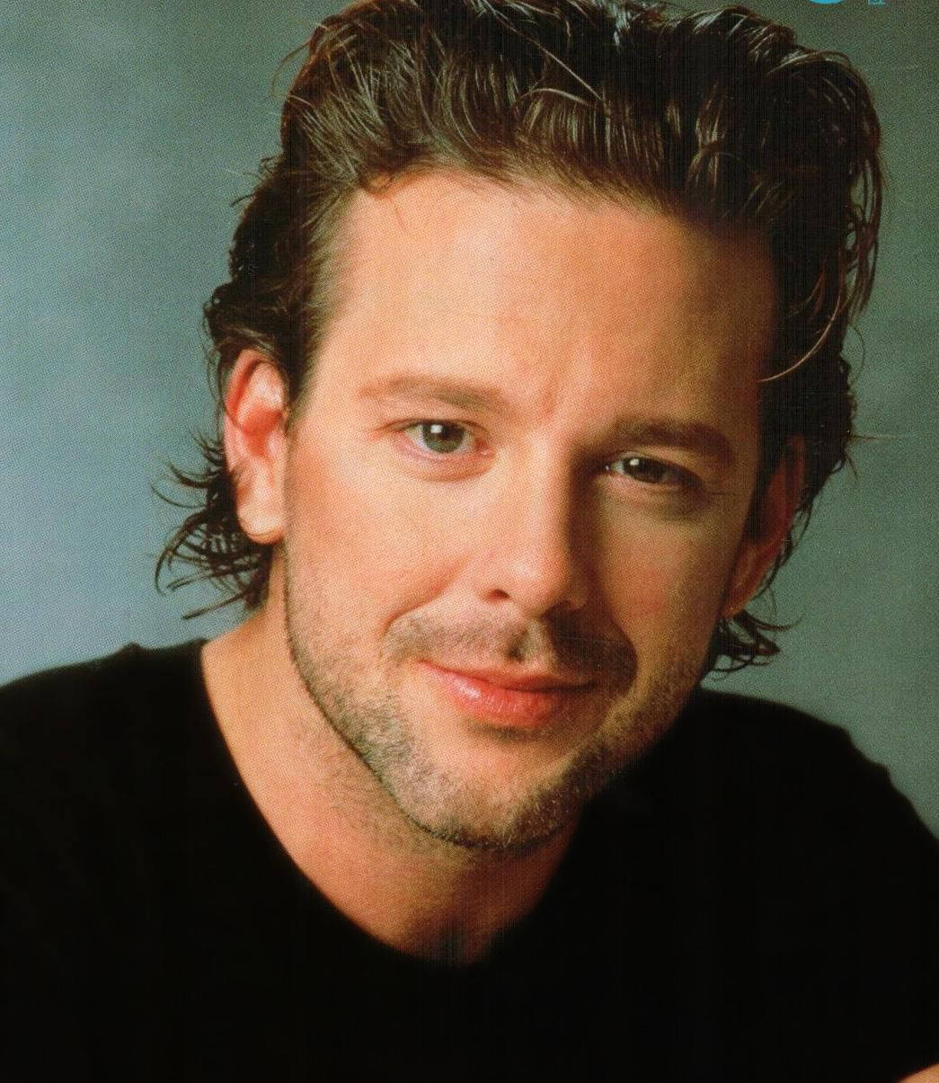 1045x1205 Download American Actor Mickey Rourke With Pompadour Hairstyle Wallpaper