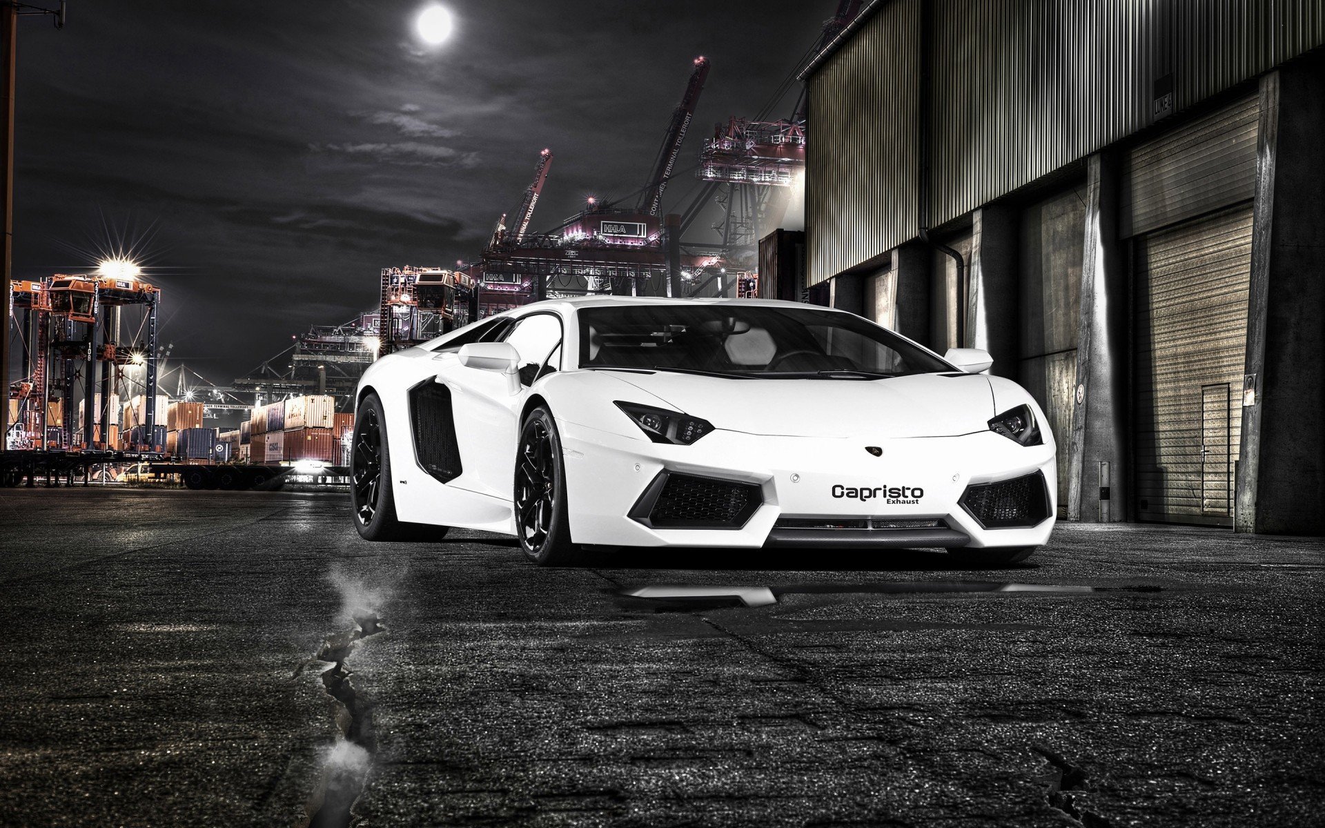 1920x1200 Poor car on the background of the night city for your phone