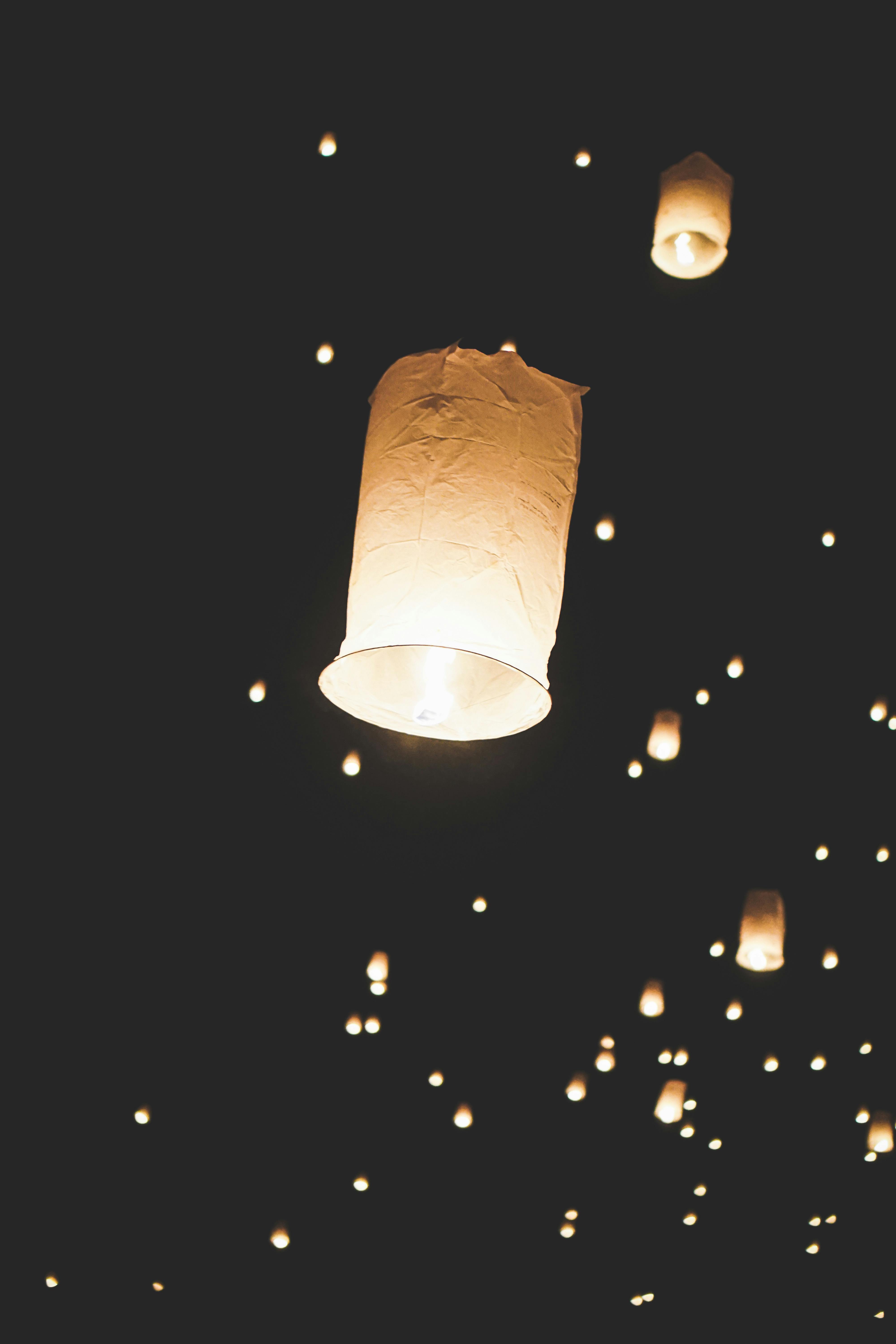 4000x6000 Flying Paper Lanterns In Black Night Sky · Free