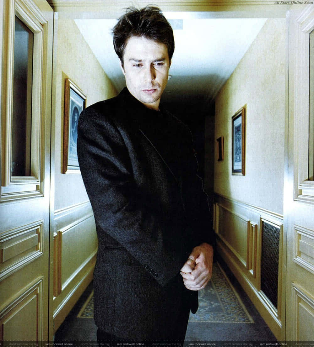 1000x1107 Download Sam Rockwell Black Suit Photography Wallpaper