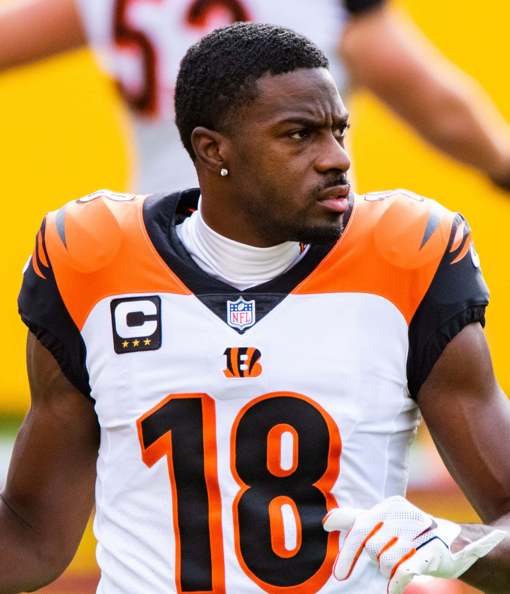1649x1920 Download Focused Football Player Number18 Wallpaper
