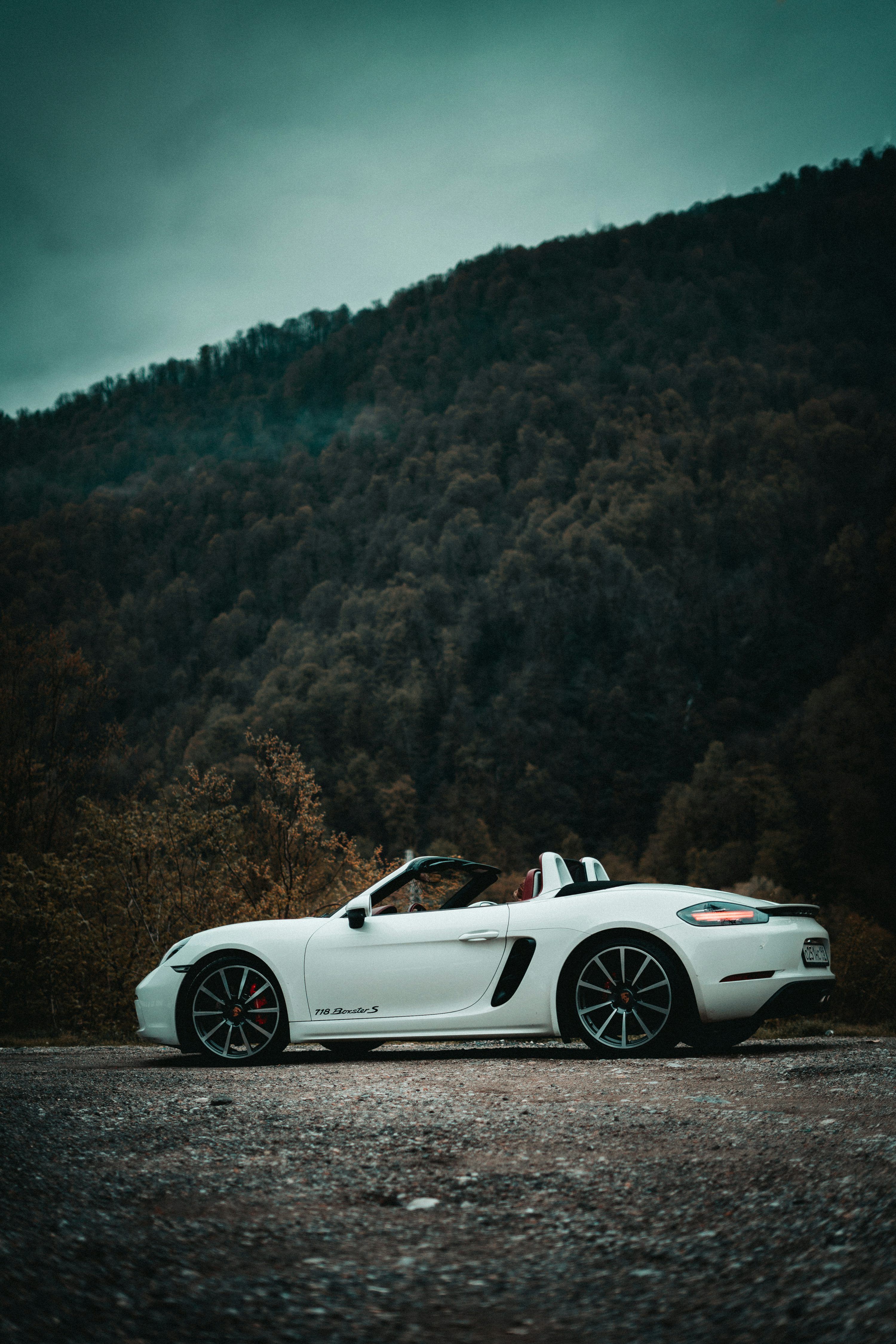 3000x4500 Silver vehicle crossing on road photo