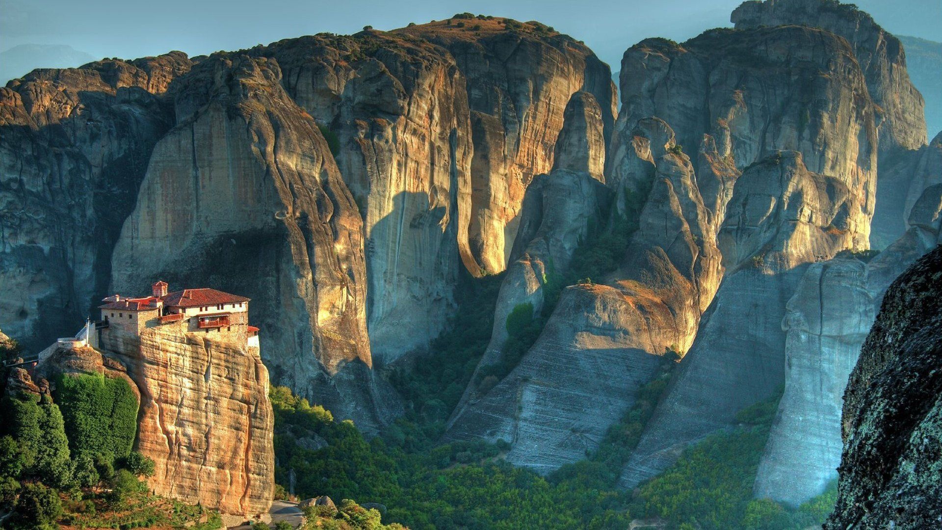 1920x1080 Meteora Majesty: Stunning Religious Cliffs in HD Wallpaper