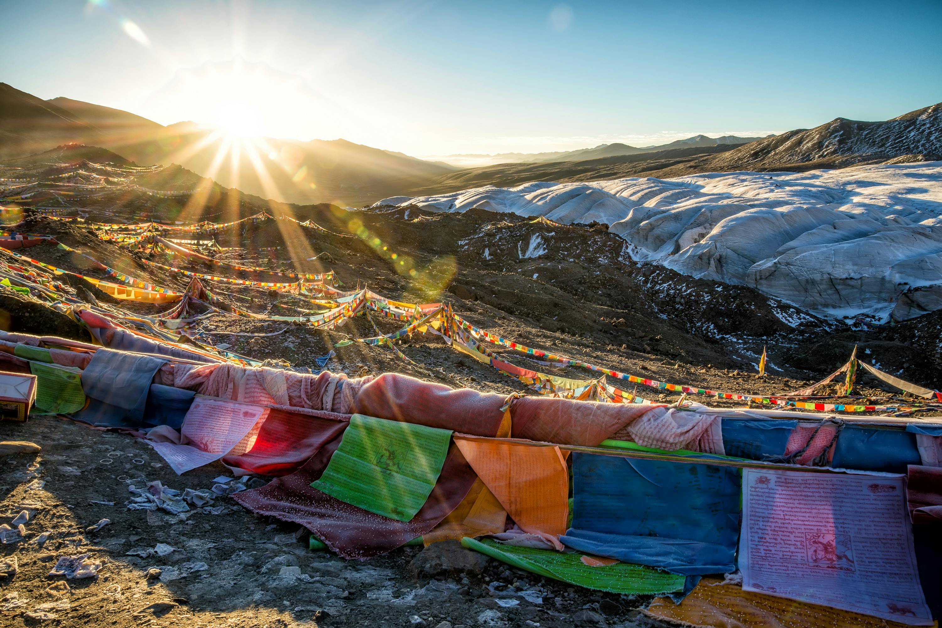 3000x2002 Assorted Color Flags On Mountain During Sunrise · Free