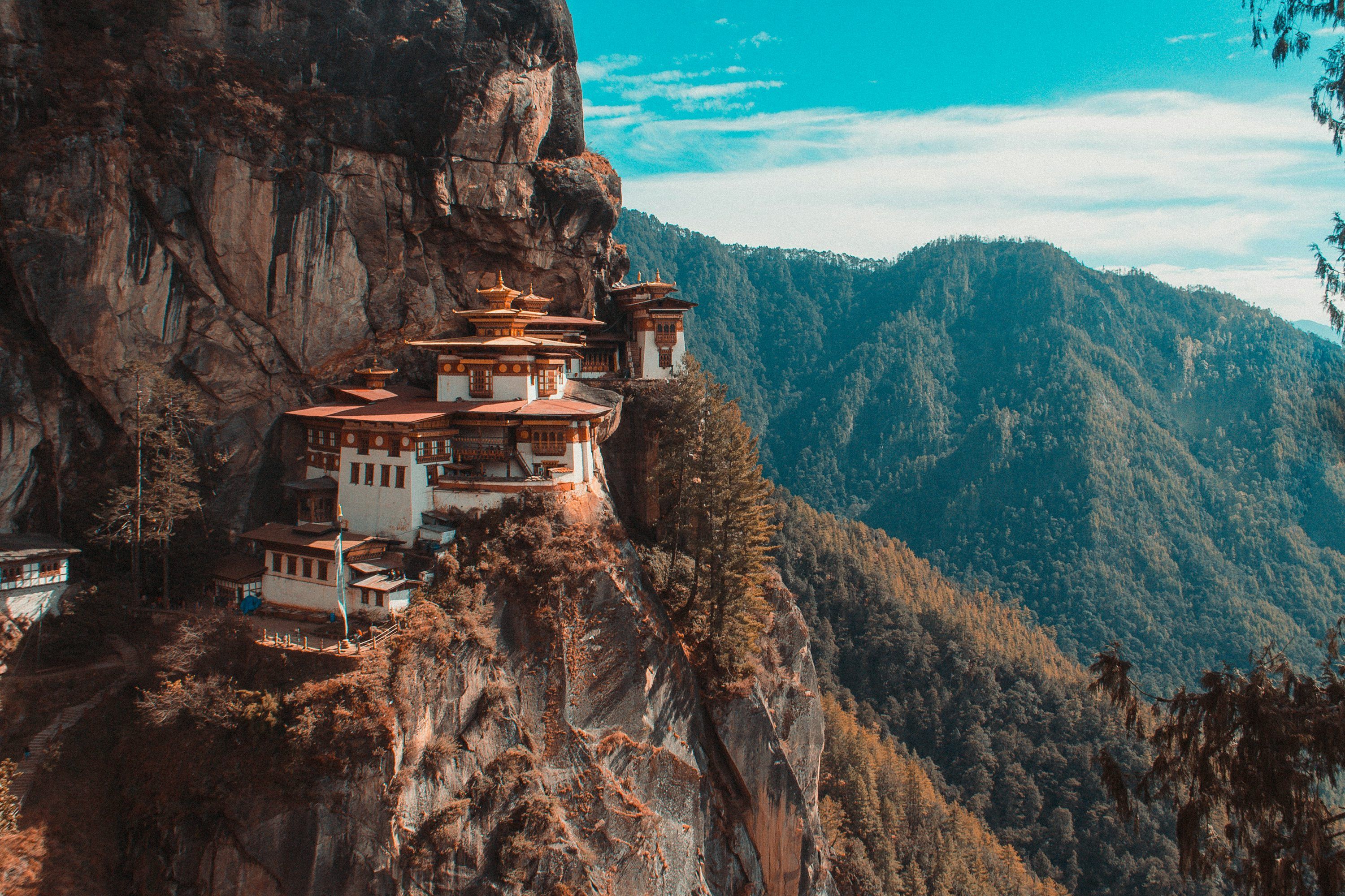 3000x2000 Paro Taktsang temple in Bhutan viewing mountain under blue and white sky photo