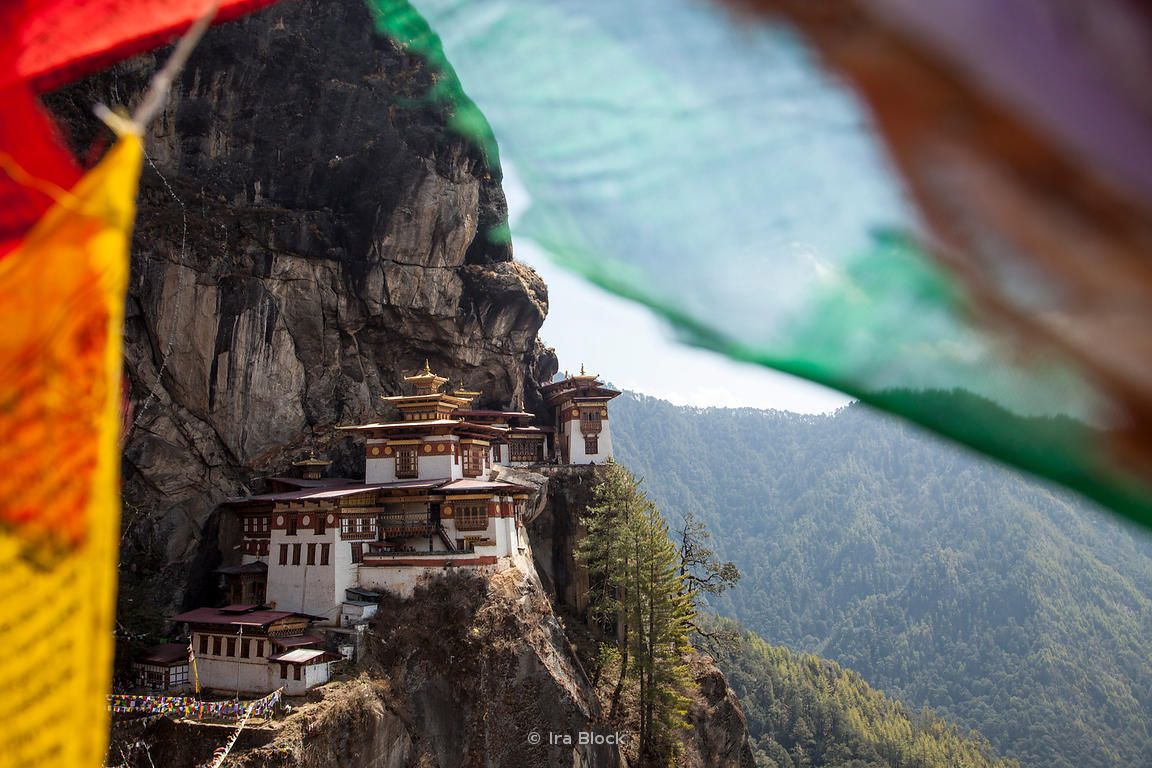 1152x768 Ira Block Photography. Paro Taktsang (Tigers Nest) temple and prayer flags in upper Paro valley, Bhutan