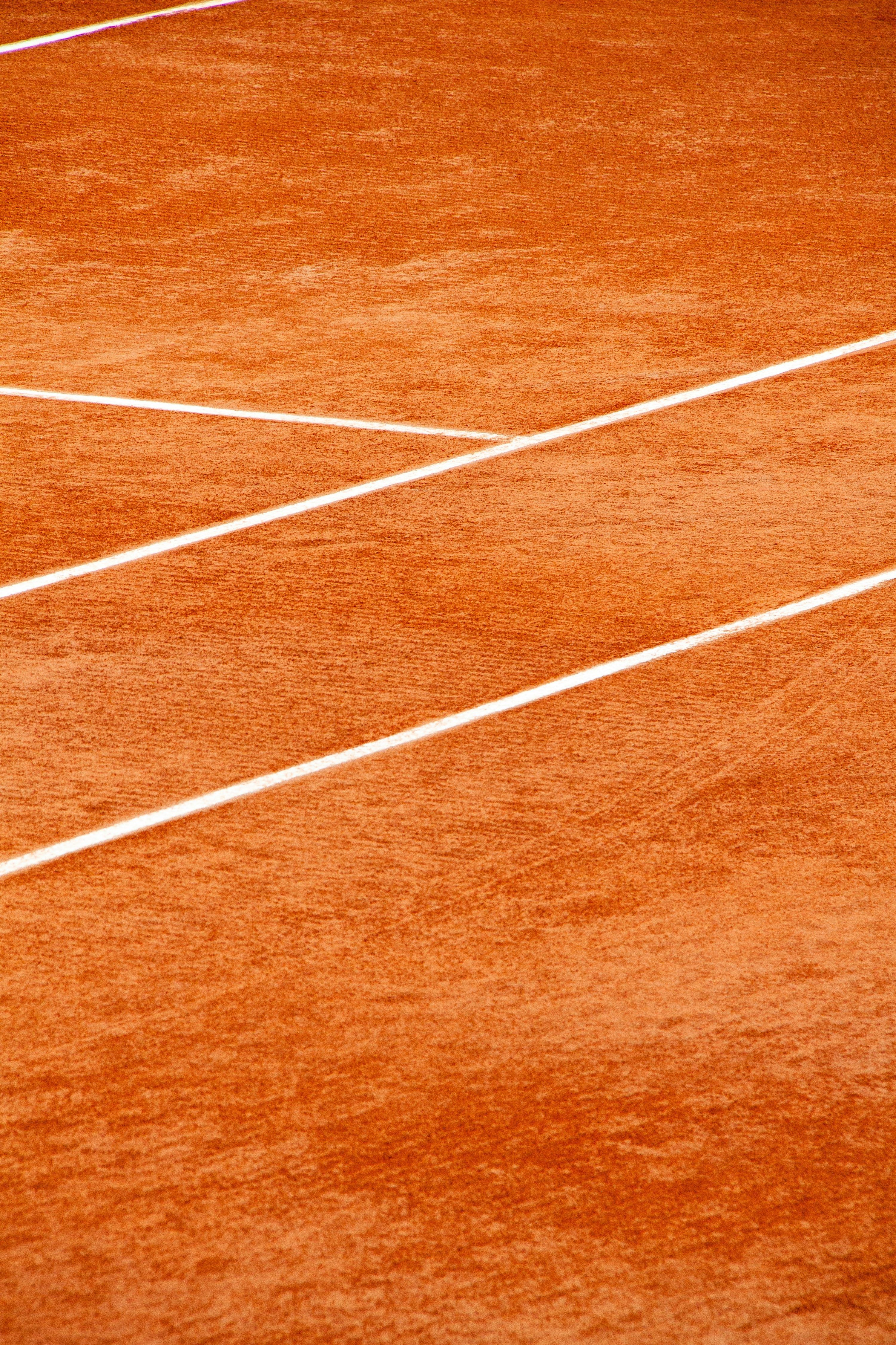 3000x4500 A clay tennis court with lines. photo