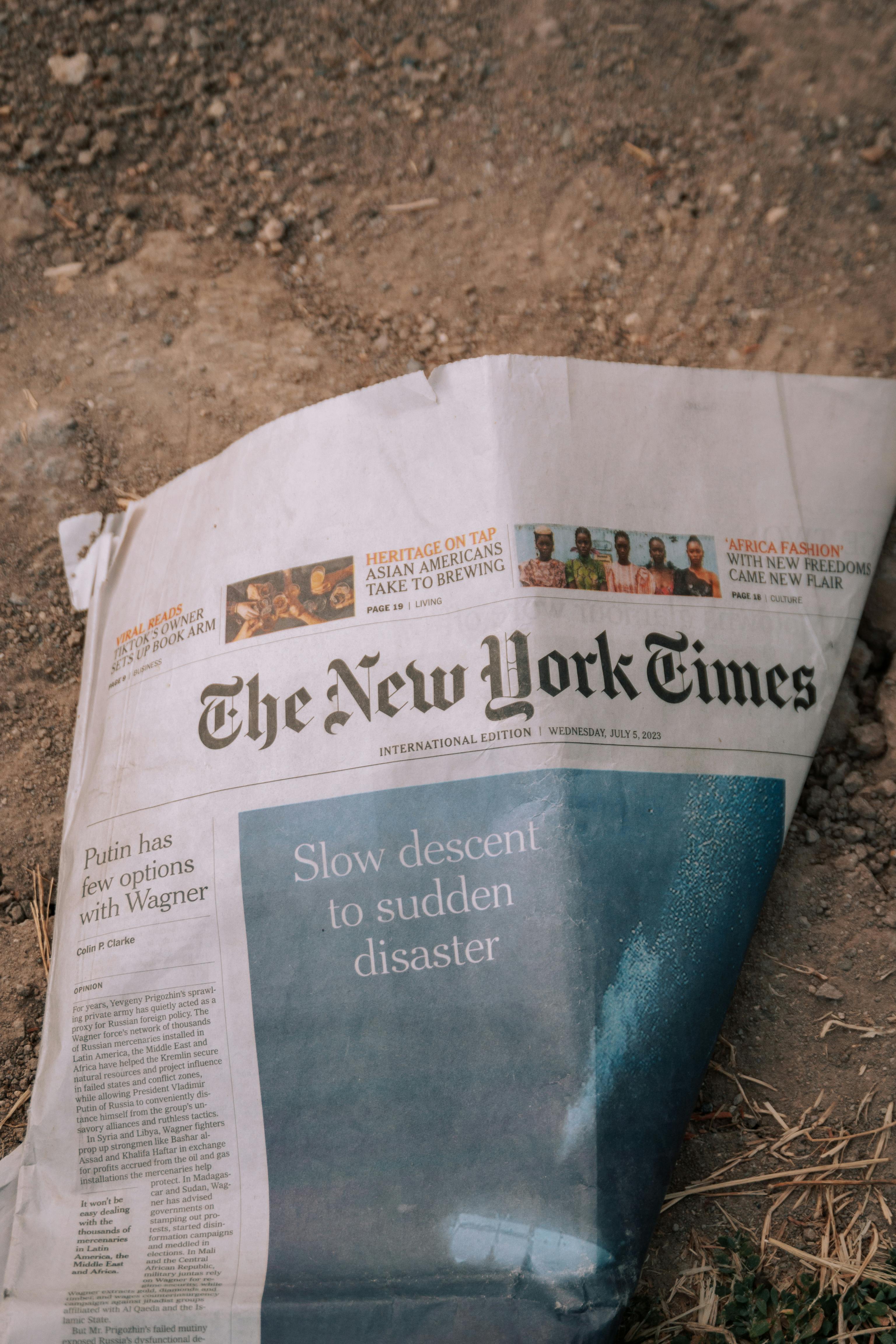 3072x4608 New York Times Newspaper Lying on the Ground · Free
