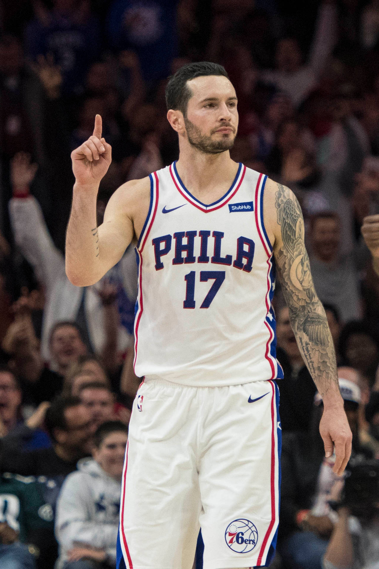 1280x1920 Download Jj Redick While Pointing Above Wallpaper